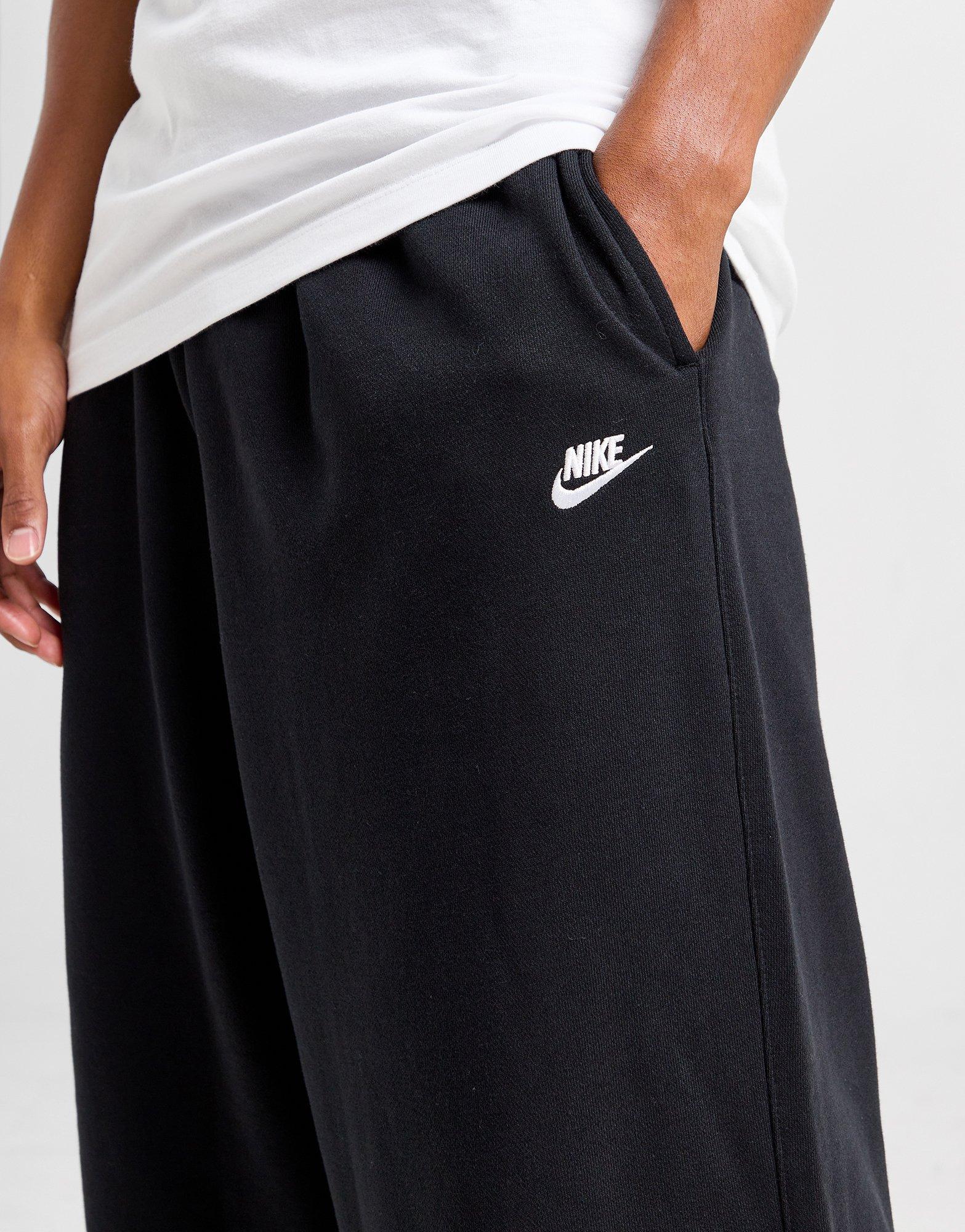 Pánské kalhoty NIKE KALHOTY  M NK CLUB FT OVERSIZED PANT HJ1822-010 Černá