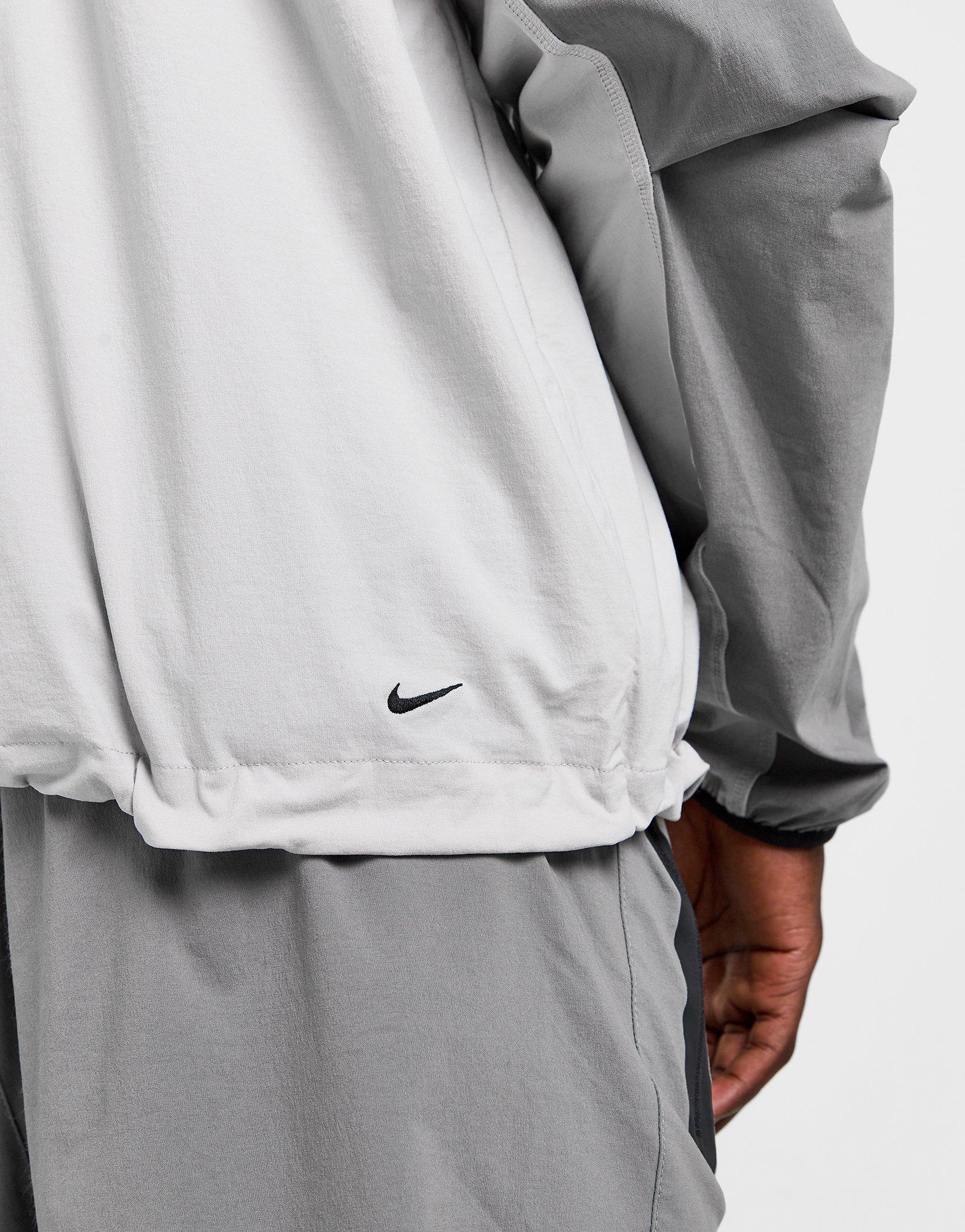 Férfi kabát NIKE PULÓVER KAPUCNIS M NK TCH WVN WR FZ JKT HM7151-014 Szürke