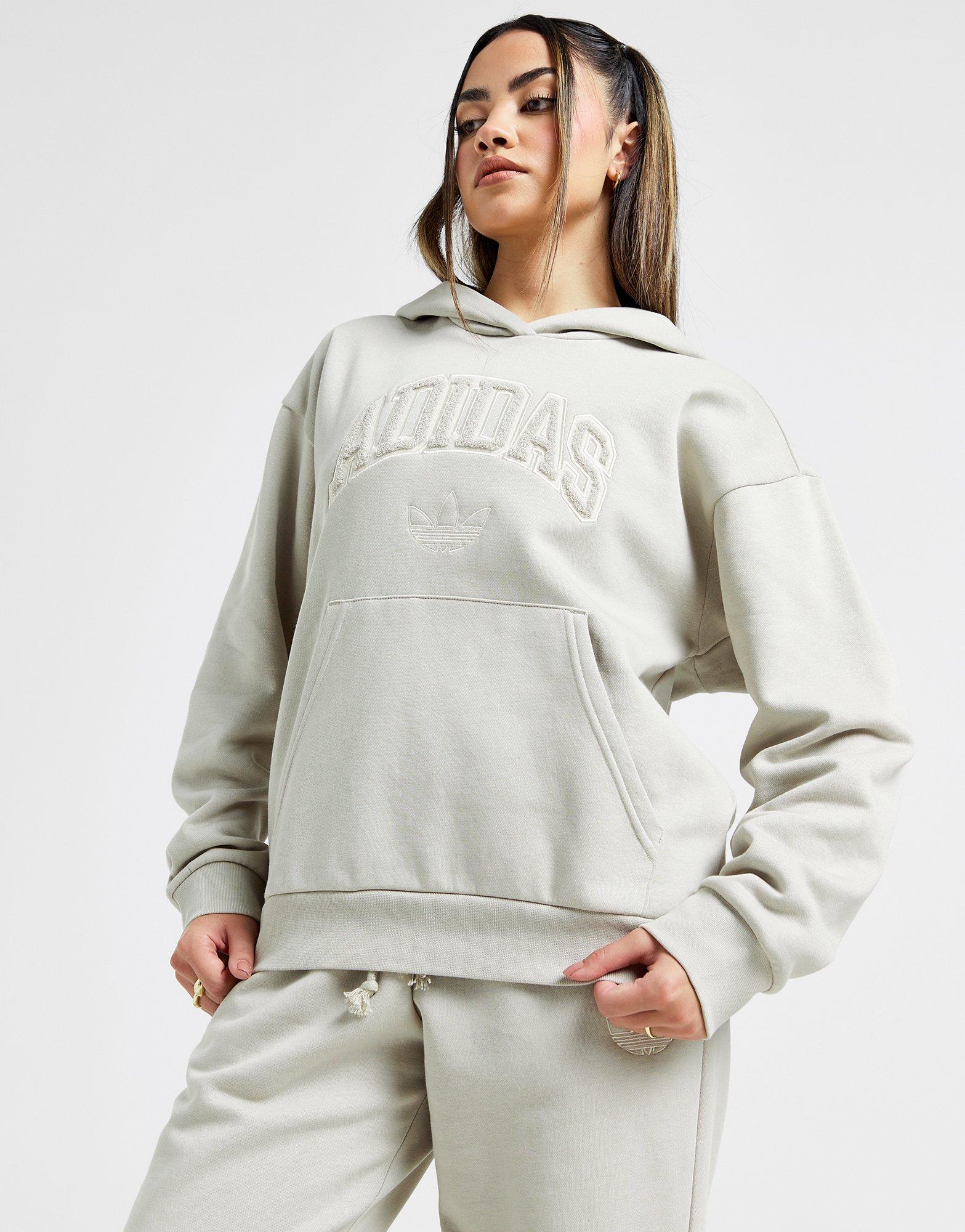 Moteriškas džemperis ADIDAS DŽEMPERIS SU GOBTUVU LOOSE HOODIE JI9822 Rusva