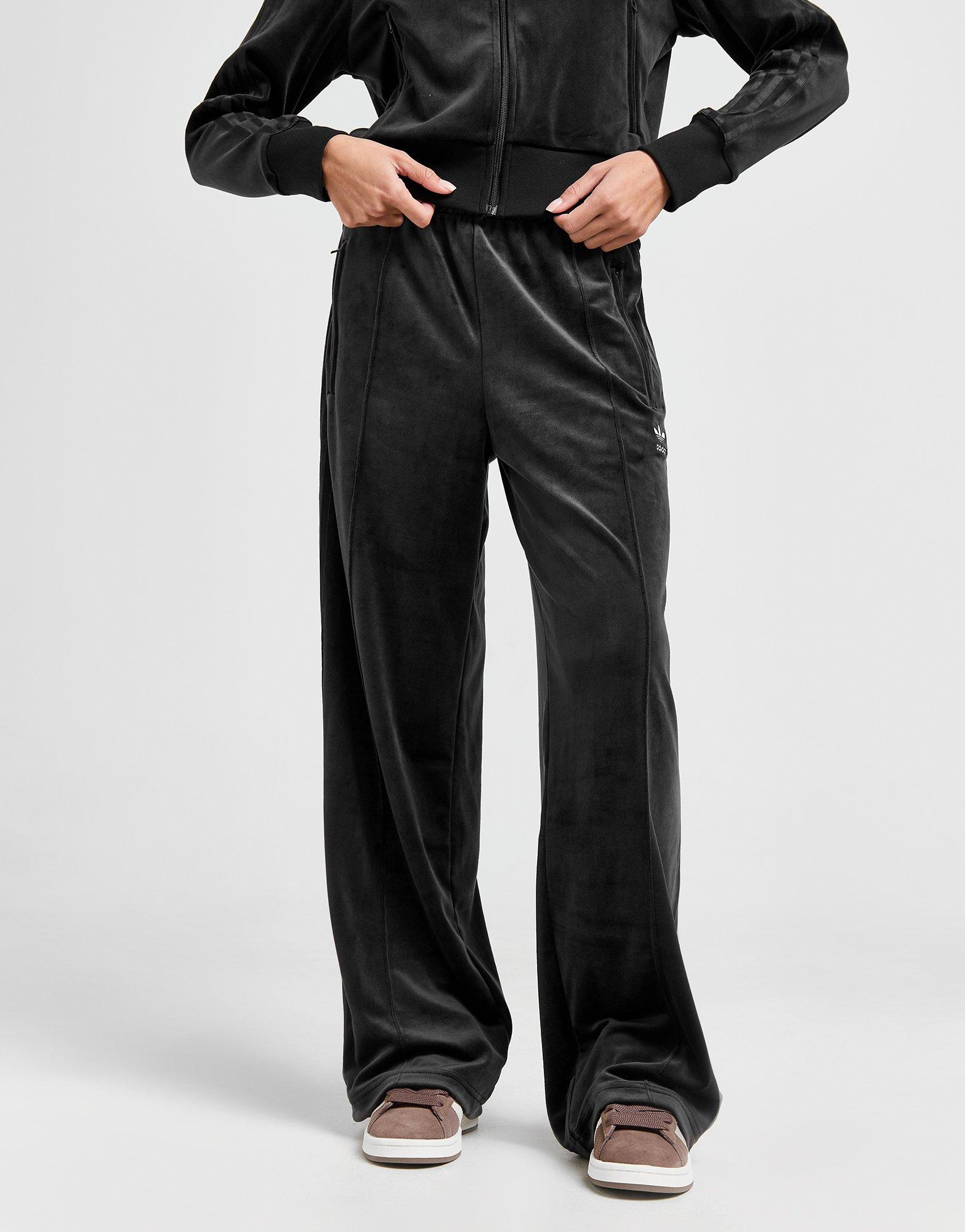 Pantaloni pentru femei ADIDAS PANTALONI  VLR FIREBIRD PANT BLK JD5496 Negru