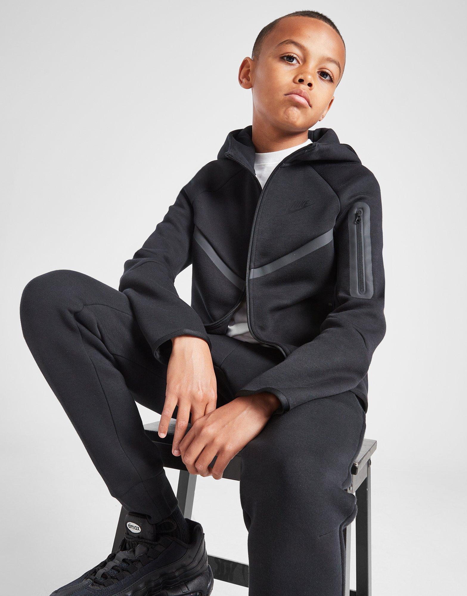 Vaikiškos kelnės NIKE KELNĖS B NSW TCH FLC JGGR - PD B HV5869-010 Juoda