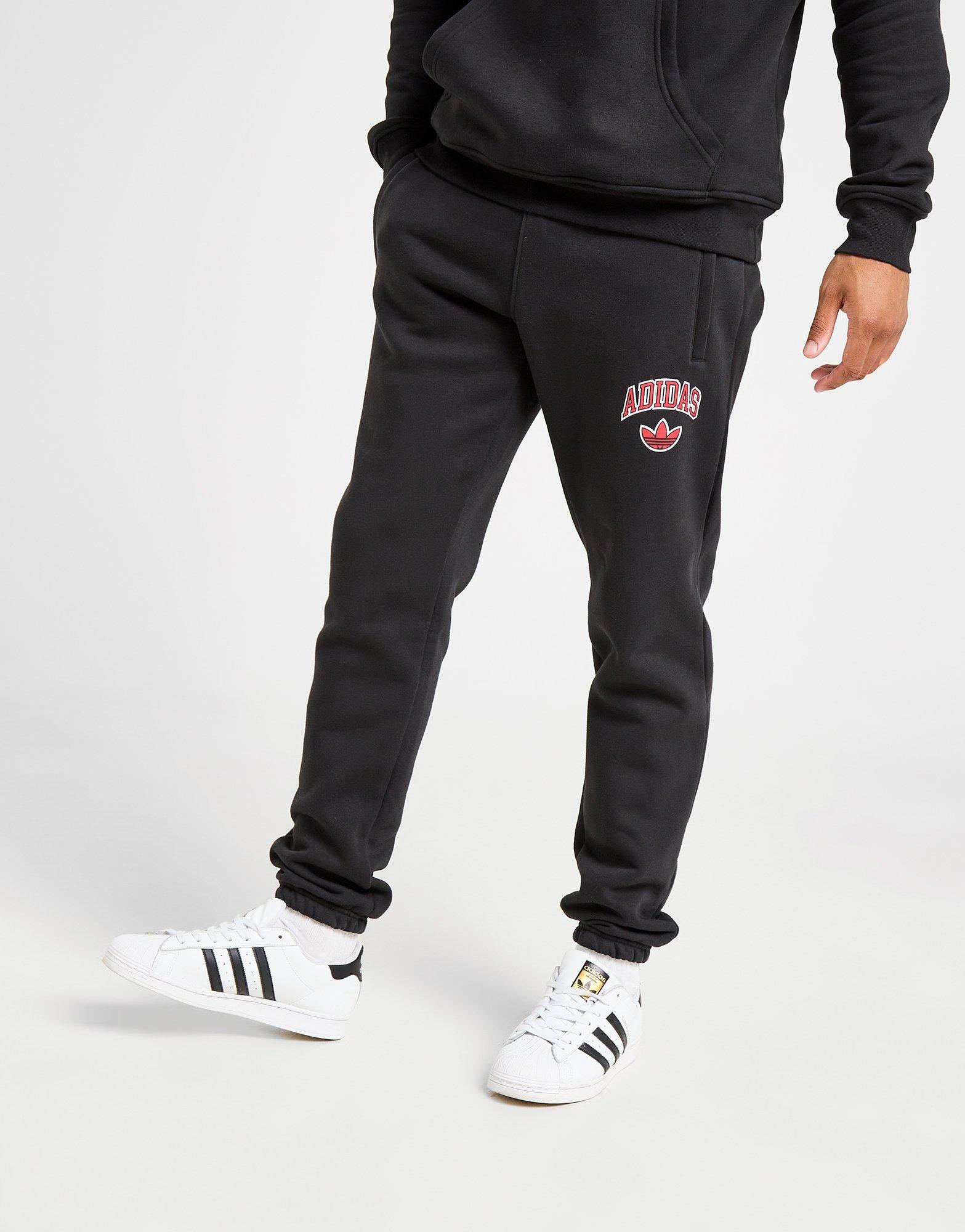 Pantaloni pentru bărbați ADIDAS PANTALONI  COLLEGIATE SLIM PANT JW6703 Negru