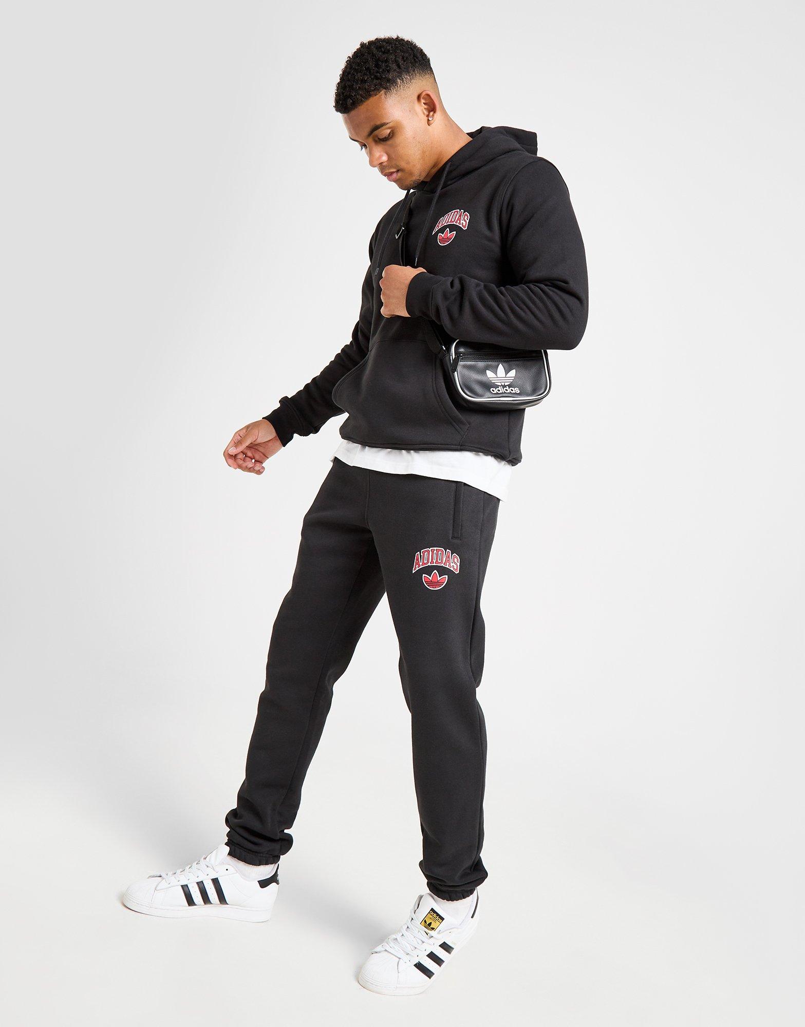 Pantaloni pentru bărbați ADIDAS PANTALONI  COLLEGIATE SLIM PANT JW6703 Negru