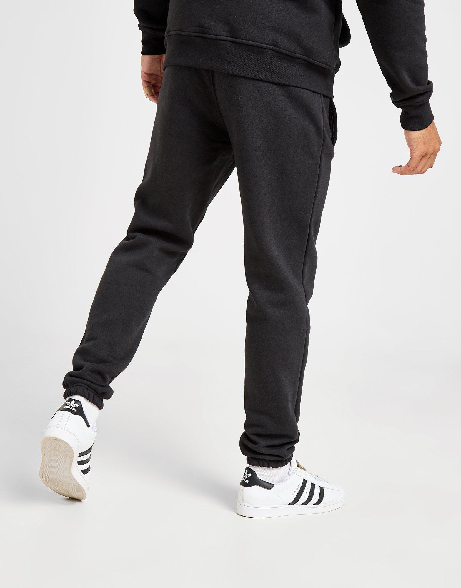 Pantaloni pentru bărbați ADIDAS PANTALONI  COLLEGIATE SLIM PANT JW6703 Negru