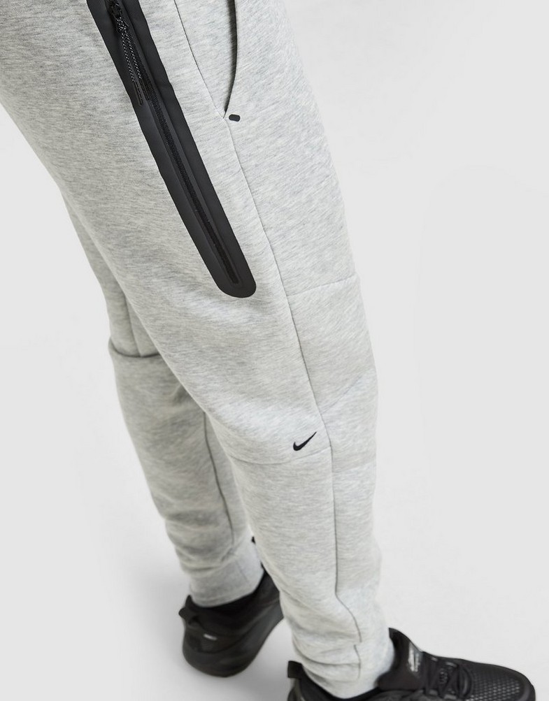 Чоловічі штани NIKE ШТАНИ M NK TCH FLC JGGR HV0959-063 Сірий