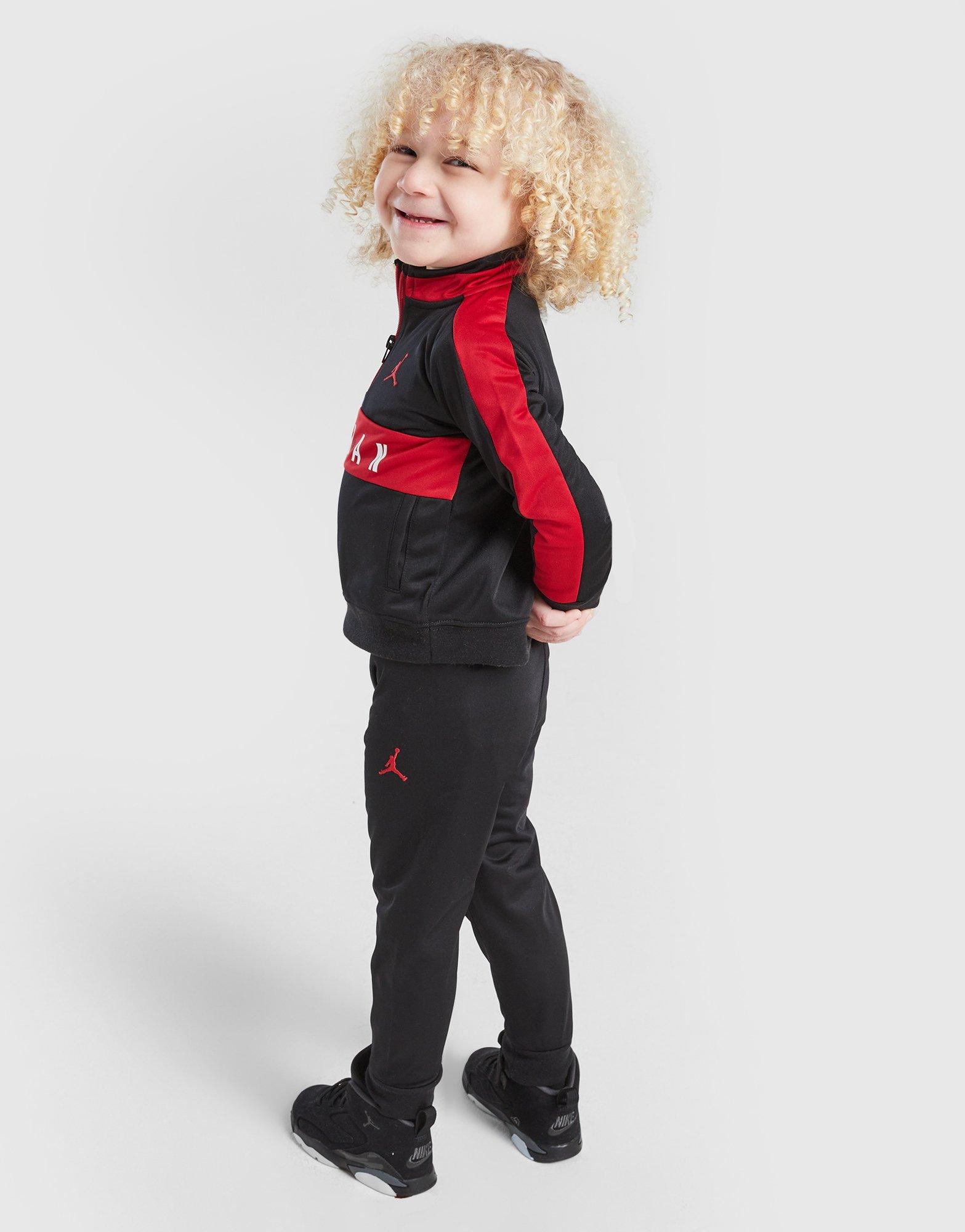 Trening pentru copii JORDAN SET POLY 1/4 ZIP ST BLK/RED B 65D805-023 Negru