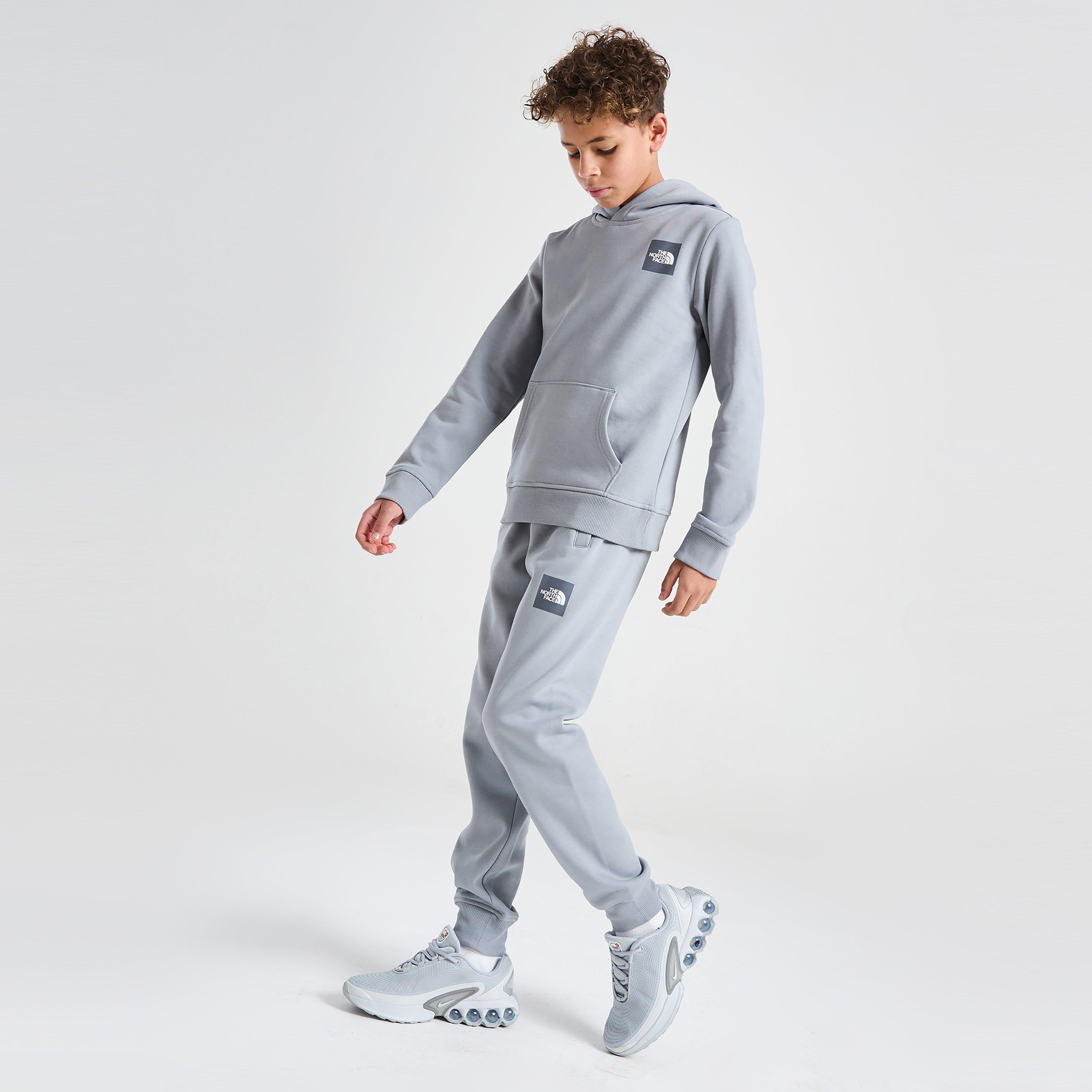 Dětské kalhoty THE NORTH FACE KALHOTY  BOX FLEECE PT TRADE