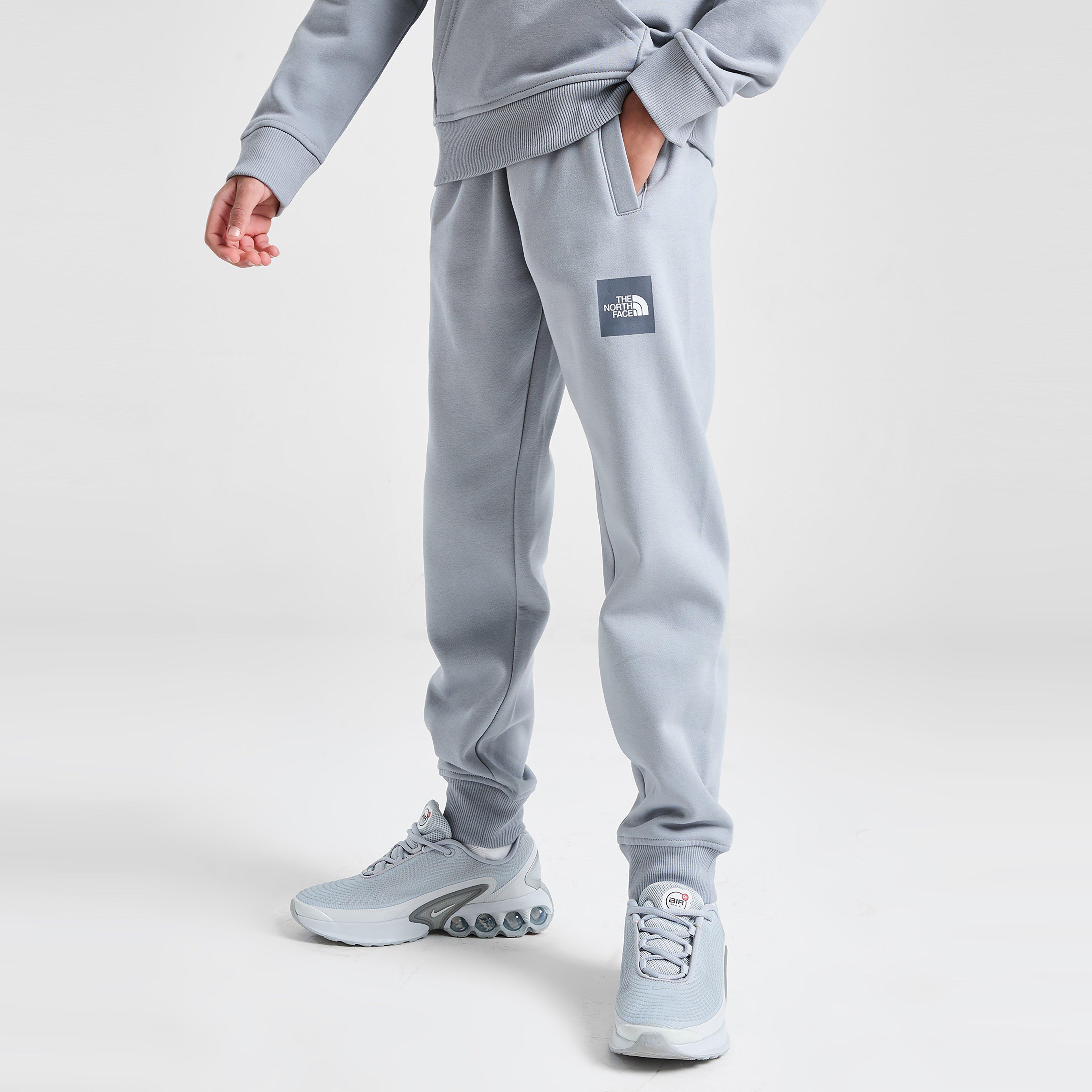 Dětské kalhoty THE NORTH FACE KALHOTY  BOX FLEECE PT TRADE