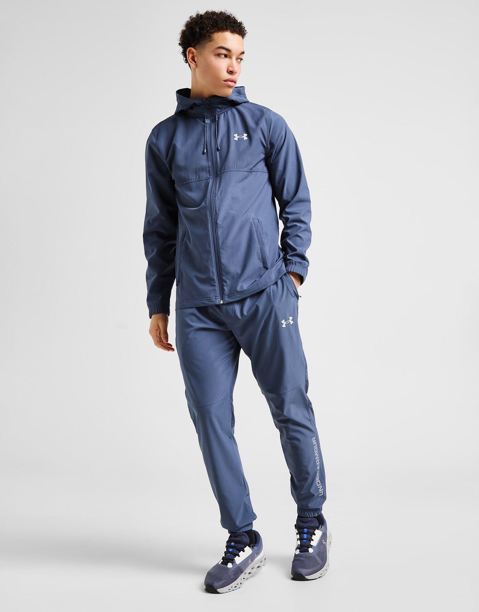 Férfi pulóverek UNDER ARMOUR PULÓVER CIPZÁRAS KAPUCNIS LOCKUP WVN 6001616-044 Szürke