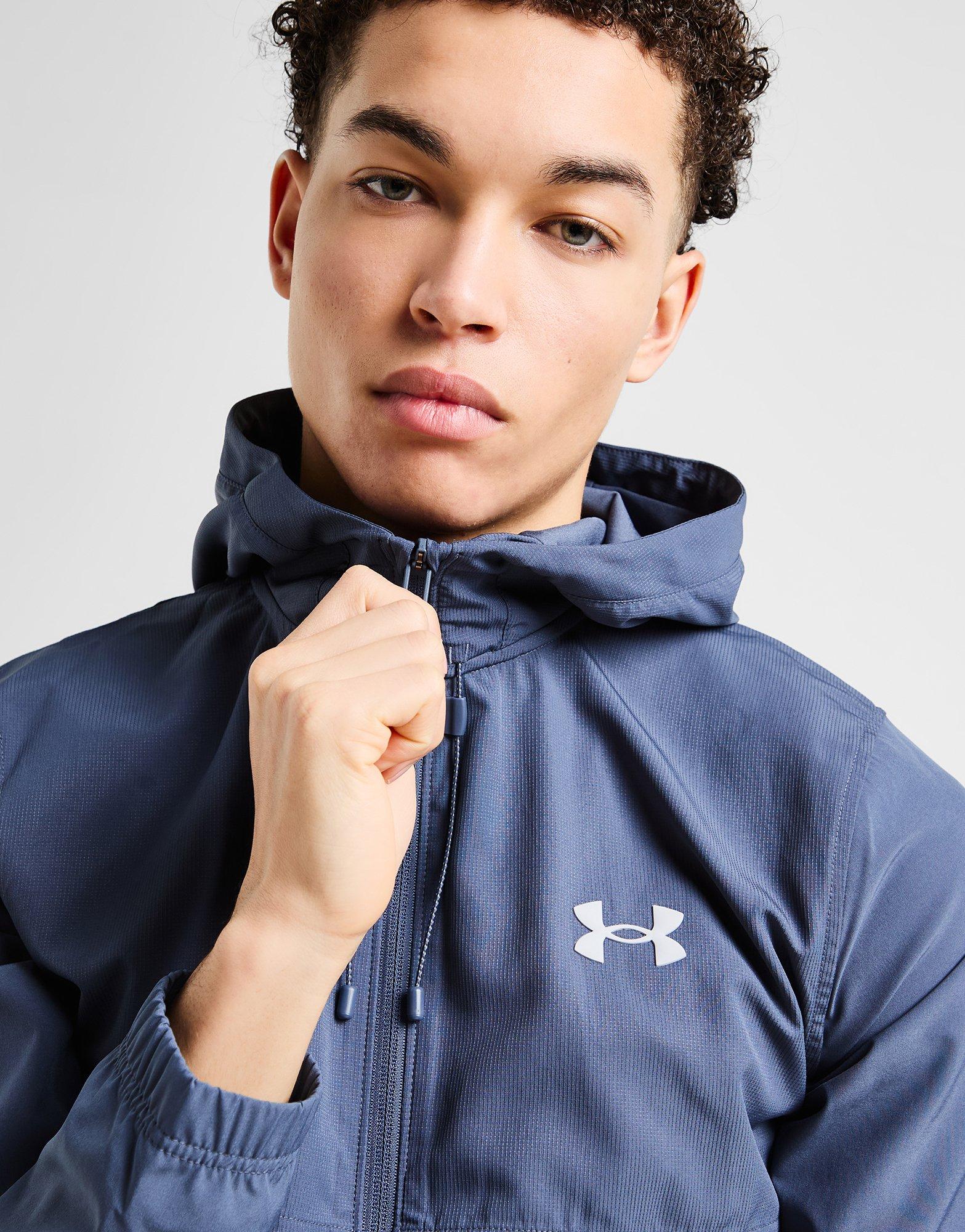 Férfi pulóverek UNDER ARMOUR PULÓVER CIPZÁRAS KAPUCNIS LOCKUP WVN 6001616-044 Szürke