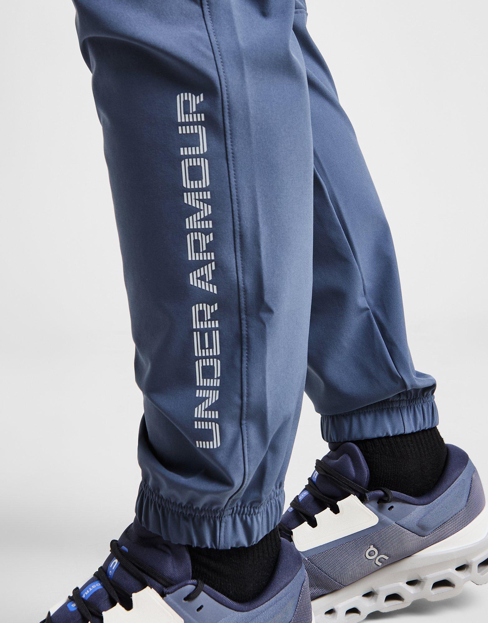 Vyriškos kelnės UNDER ARMOUR KELNĖS LOCKUP WVN MIX PT D.PR 6001617-044 Pilka