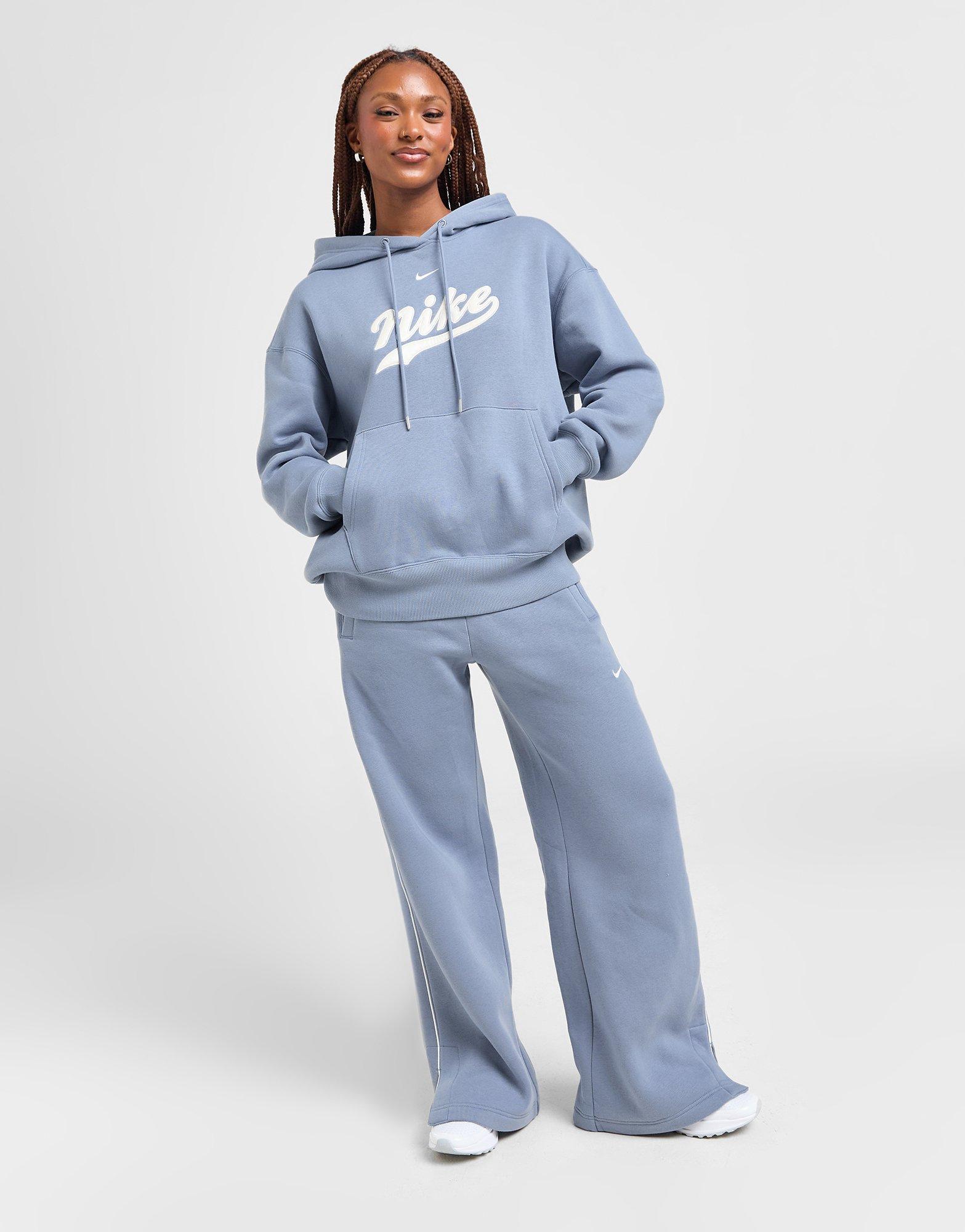 Bluză pentru femei NIKE BLUZĂ CU GLUGĂ W NSW PHNX FLC HDY TRND IB9974-493 Albastru