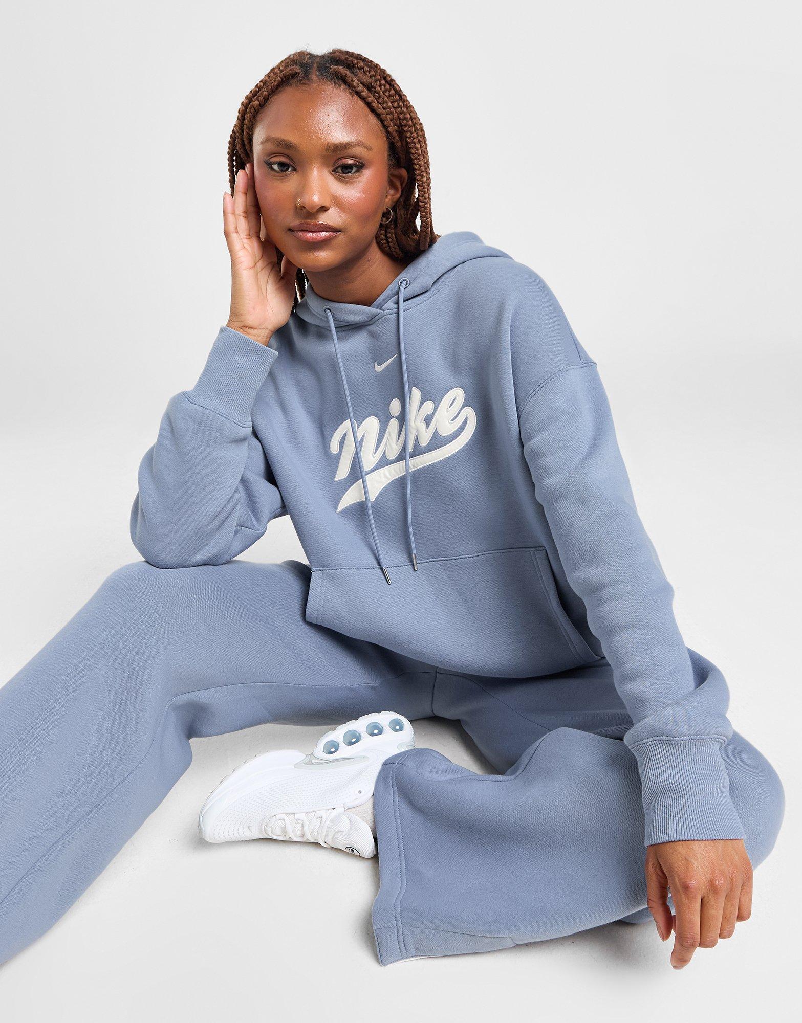 Bluză pentru femei NIKE BLUZĂ CU GLUGĂ W NSW PHNX FLC HDY TRND IB9974-493 Albastru