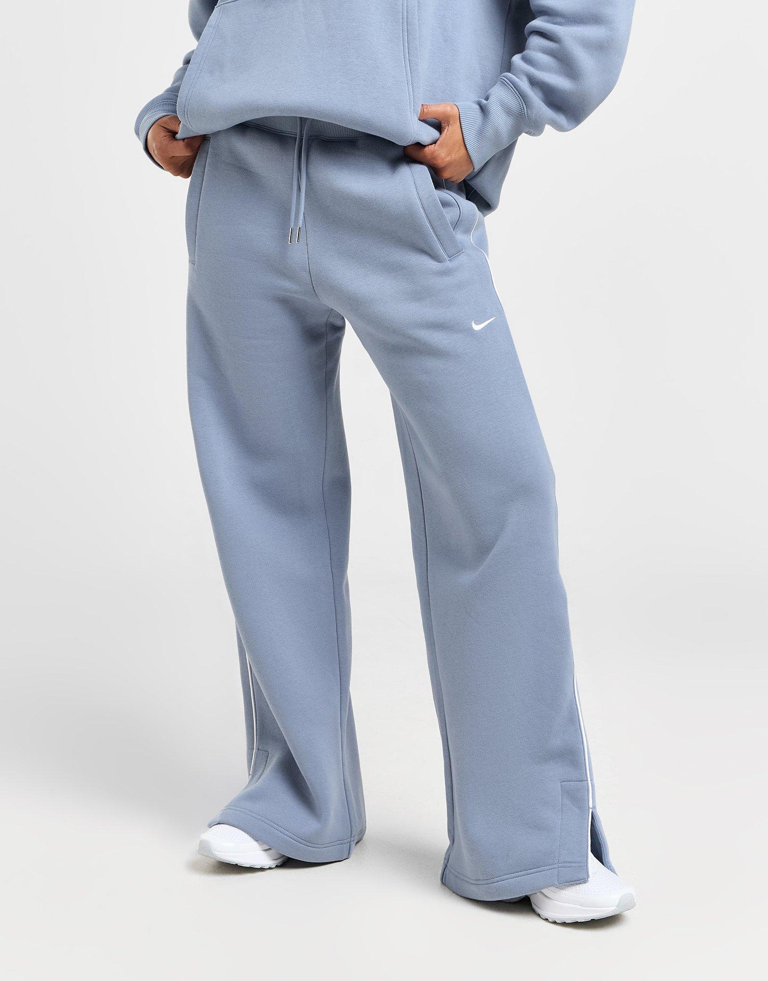 Dámské kalhoty NIKE KALHOTY  W NSW PHNX FLC PANT TRND HV3775-493 Modrá