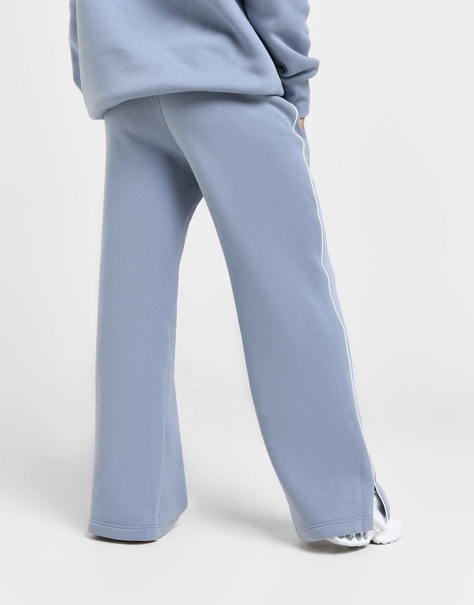 Dámské kalhoty NIKE KALHOTY  W NSW PHNX FLC PANT TRND HV3775-493 Modrá