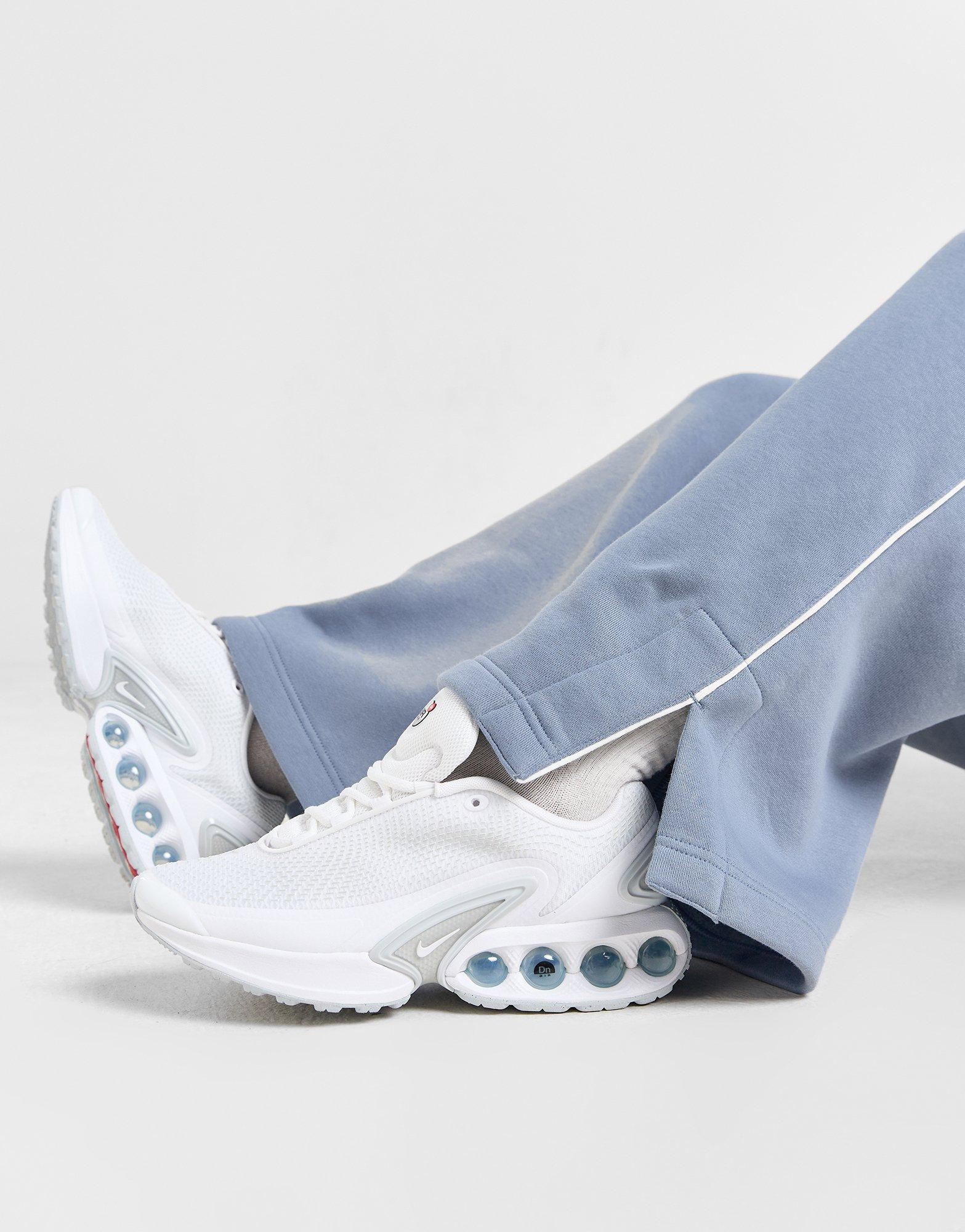 Dámské kalhoty NIKE KALHOTY  W NSW PHNX FLC PANT TRND HV3775-493 Modrá