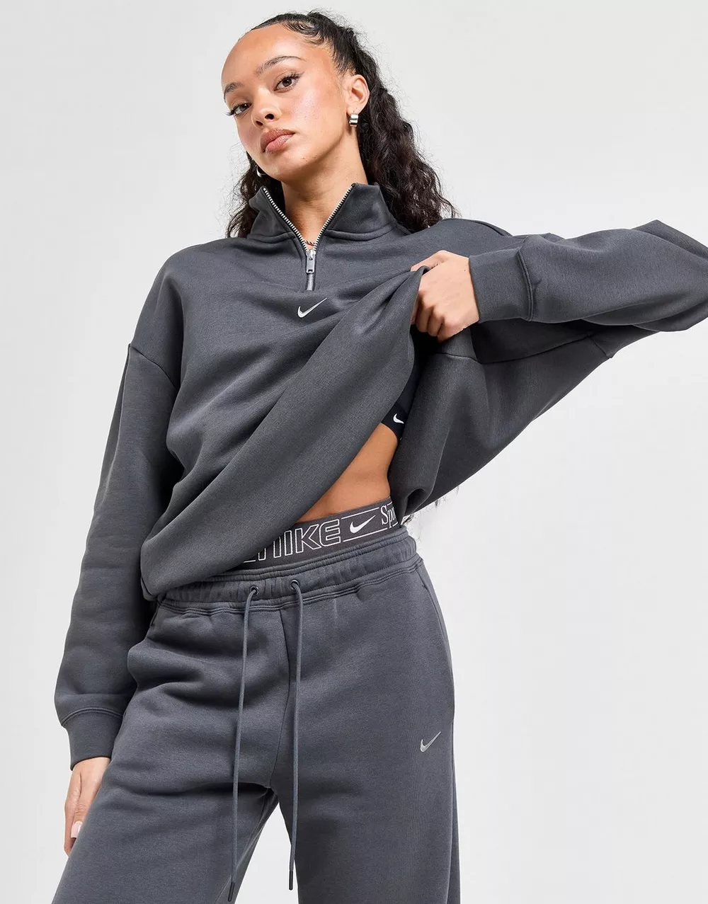 NIKE КОФТА НА БЛИСКАВЦІ W NSW FLC QZ GLS, фото 1 з 5