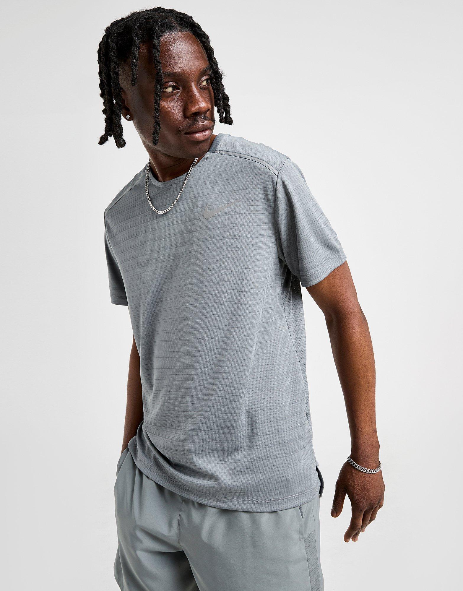 Pánske tričko NIKE TRIČKO M NK DF MILER SS FZ4782-065 Sivá