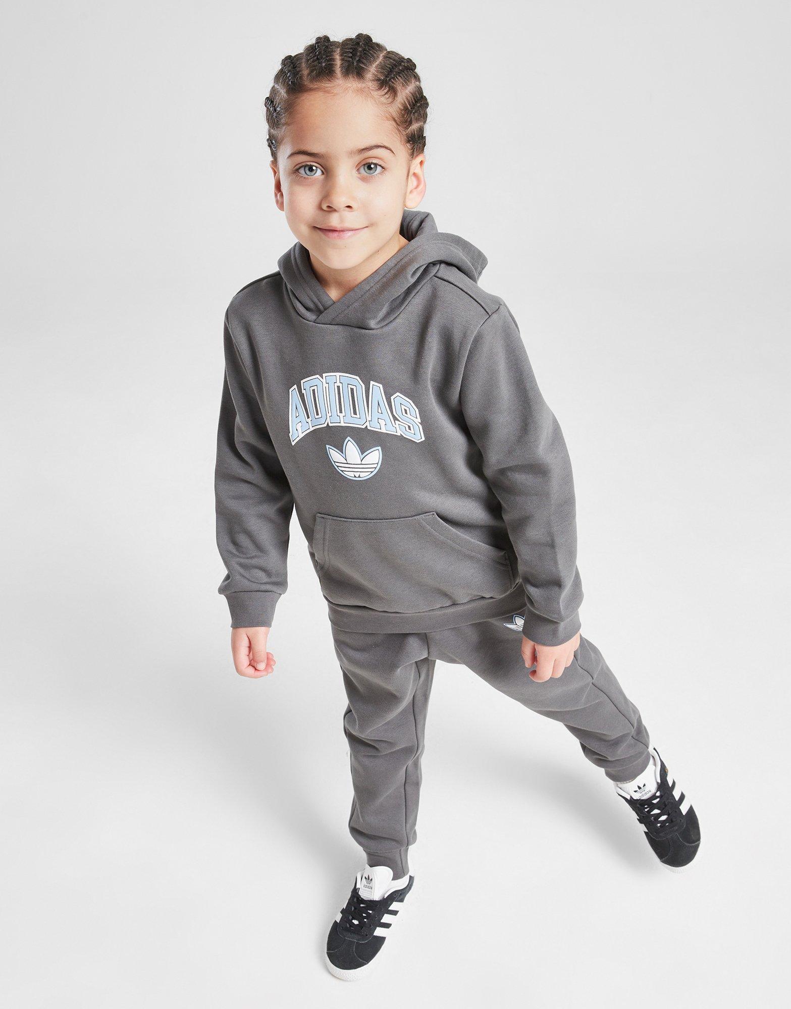 Детски анцуг ADIDAS КОМПЛЕКТ VARSITY OH SUIT GRY/BLU$ B JM1290 Сив