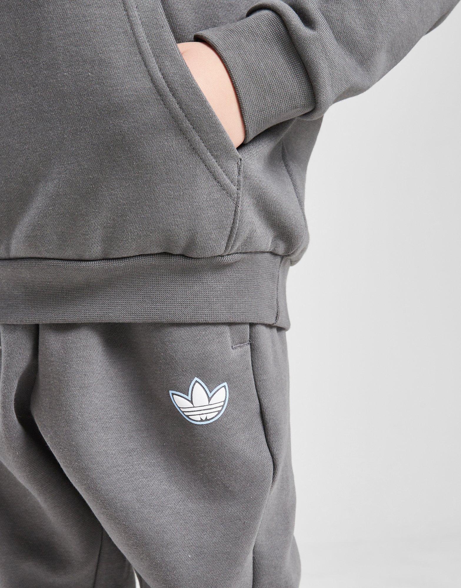 Детски анцуг ADIDAS КОМПЛЕКТ VARSITY OH SUIT GRY/BLU$ B JM1290 Сив