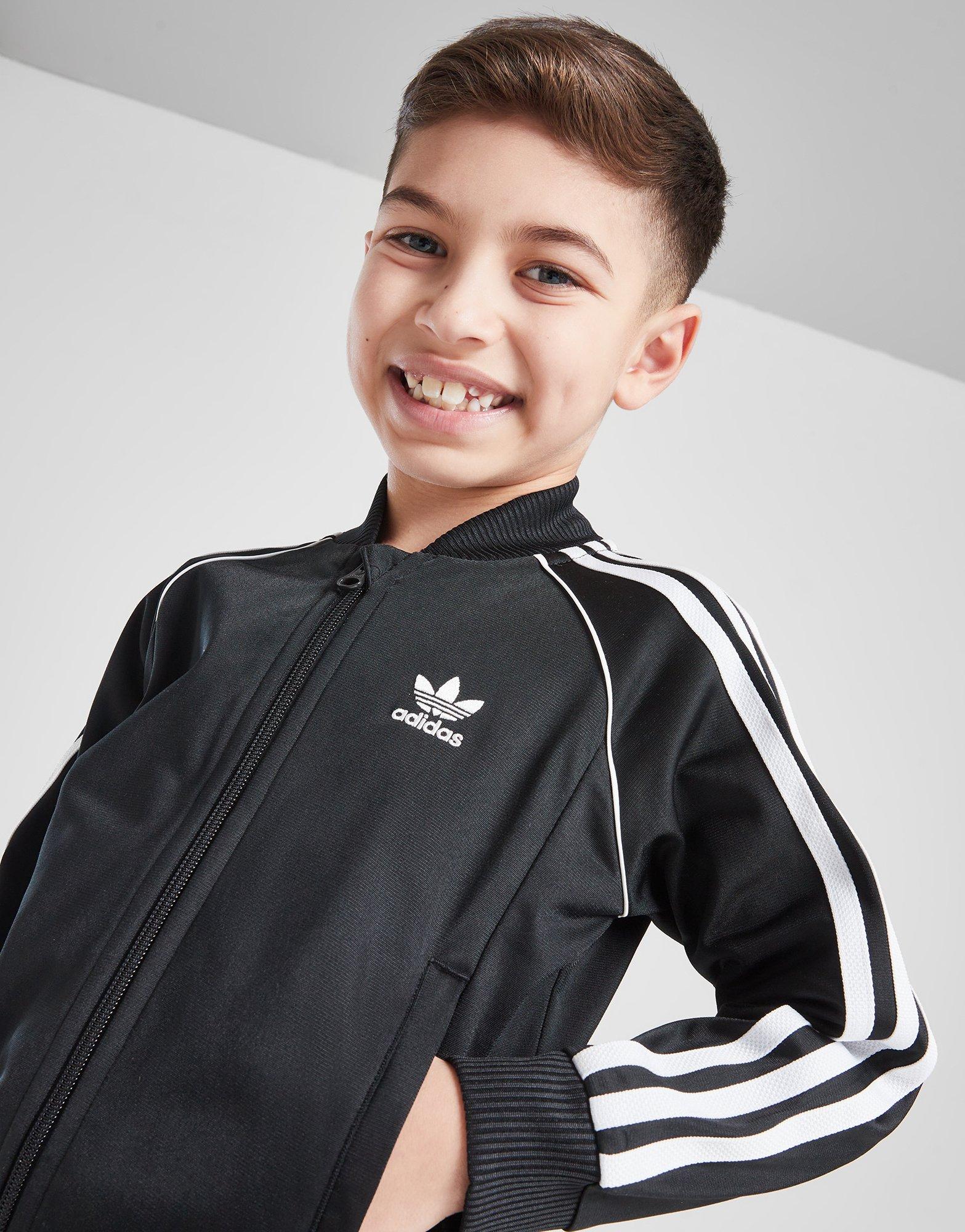 Детски анцуг ADIDAS КОМПЛЕКТ SSTAR SUIT BLK/WHT B IX7624 Черен