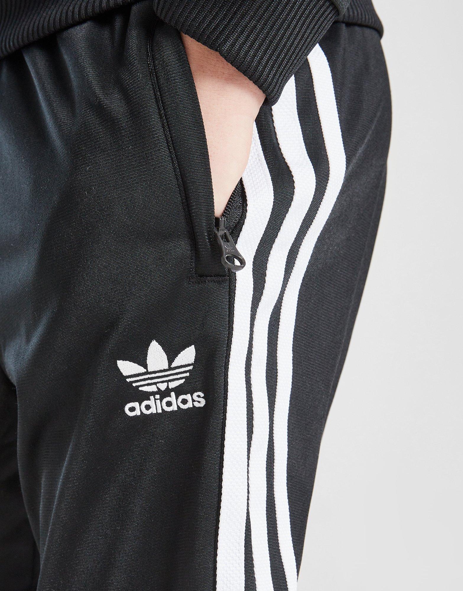 Детски анцуг ADIDAS КОМПЛЕКТ SSTAR SUIT BLK/WHT B IX7624 Черен