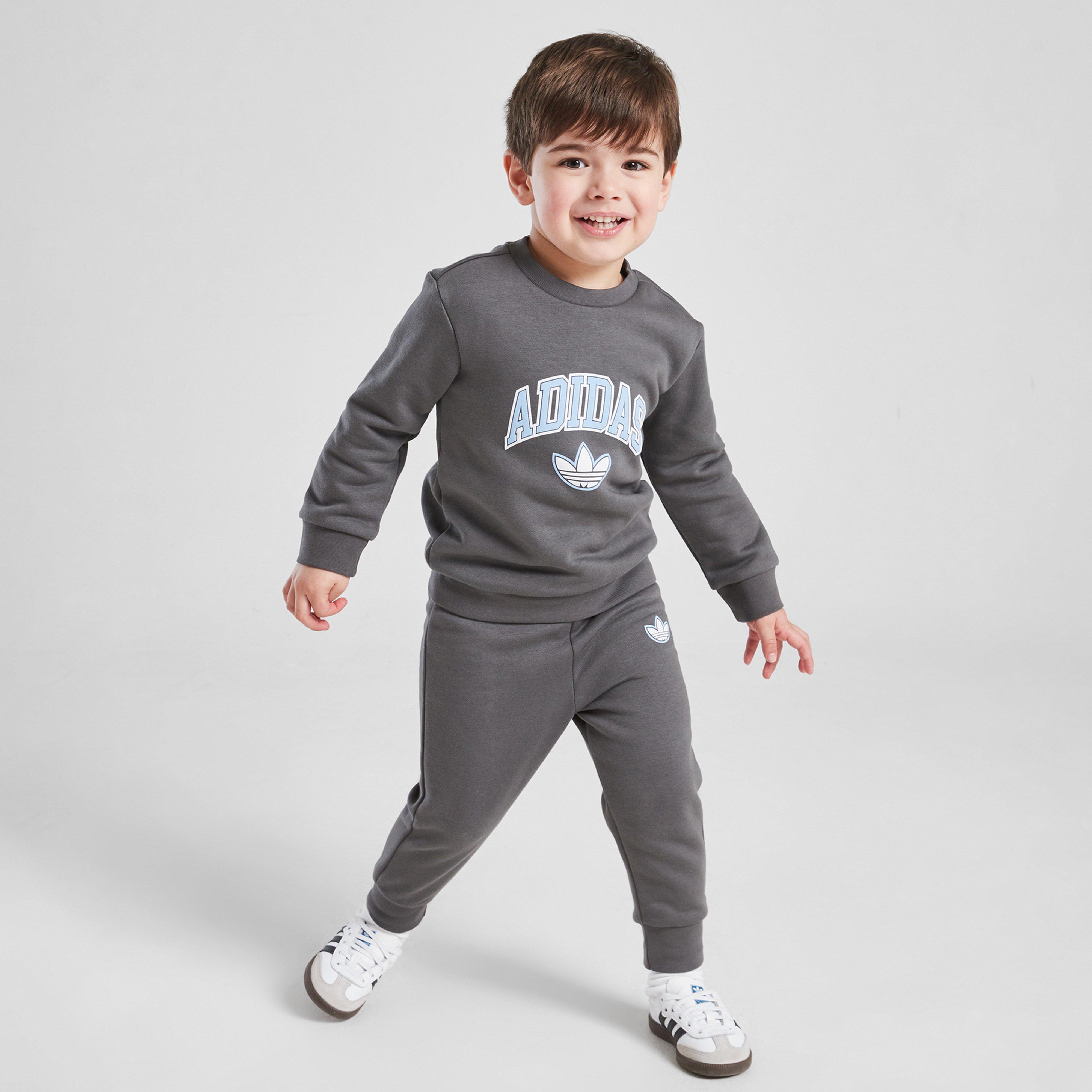 Dětská tepláková souprava ADIDAS SOUPRAVA VARSITY OH SUIT GRY/BLU$ B