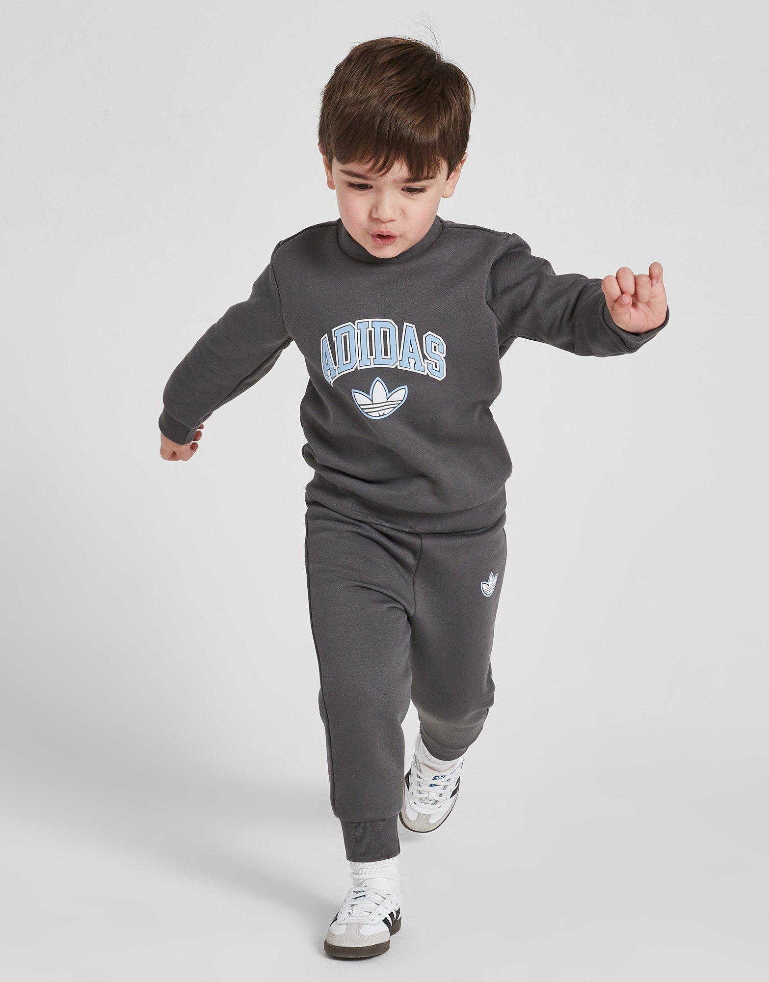 Детски анцуг ADIDAS КОМПЛЕКТ VARSITY OH SUIT GRY/BLU$ B JM1294 Сив