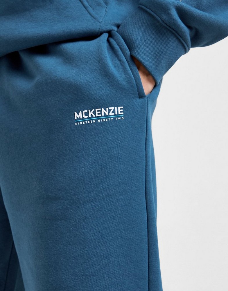 Pantaloni pentru bărbați MCKENZIE PANTALONI  ESS FLC PNT MCKTM16686110 Bleumarin