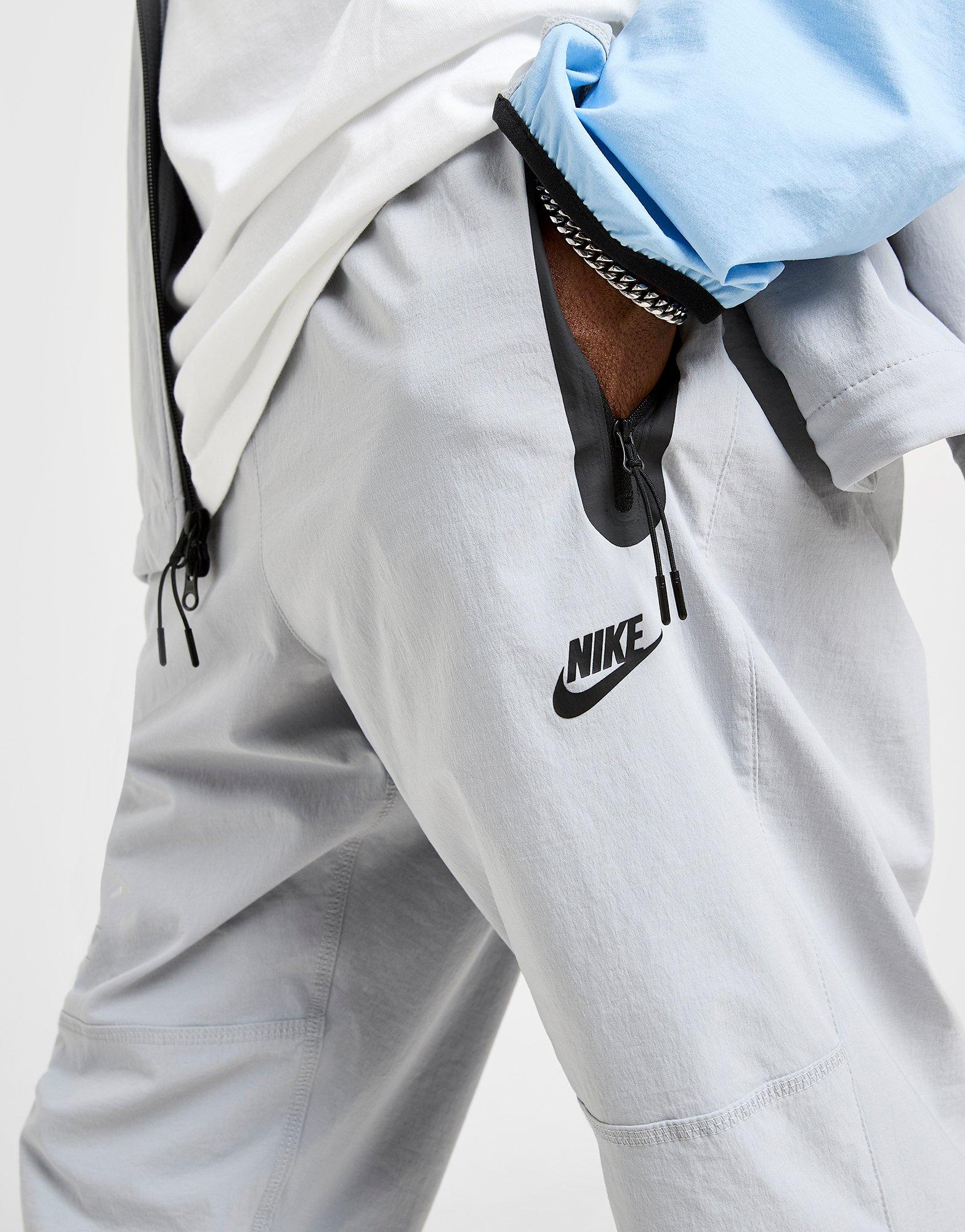 Pánské kalhoty NIKE KALHOTY  M NK TCH WVN OH PANT IB6663-012 Šedá