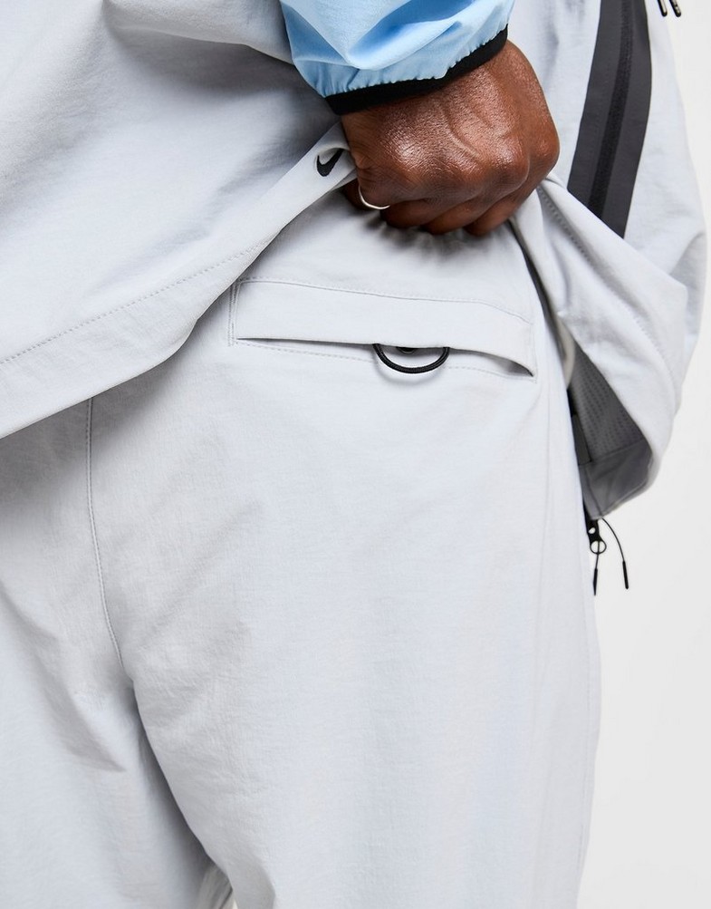 Чоловічі штани NIKE ШТАНИ M NK TCH WVN OH PANT IB6663-012 Сірий