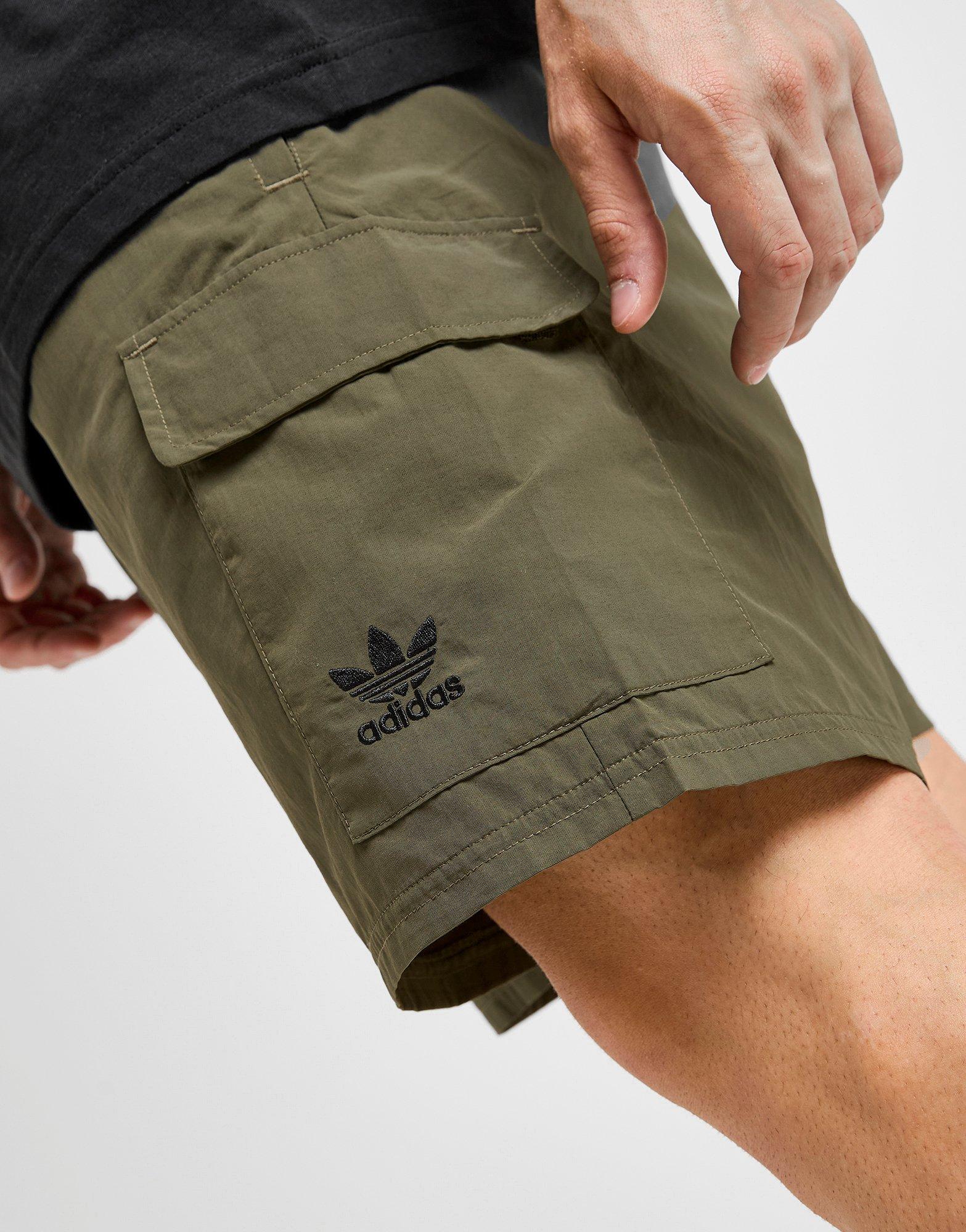 Krótkie spodenki, szorty męskie ADIDAS SZORTY ESS WVN SHORTS KB8342 Beżowy