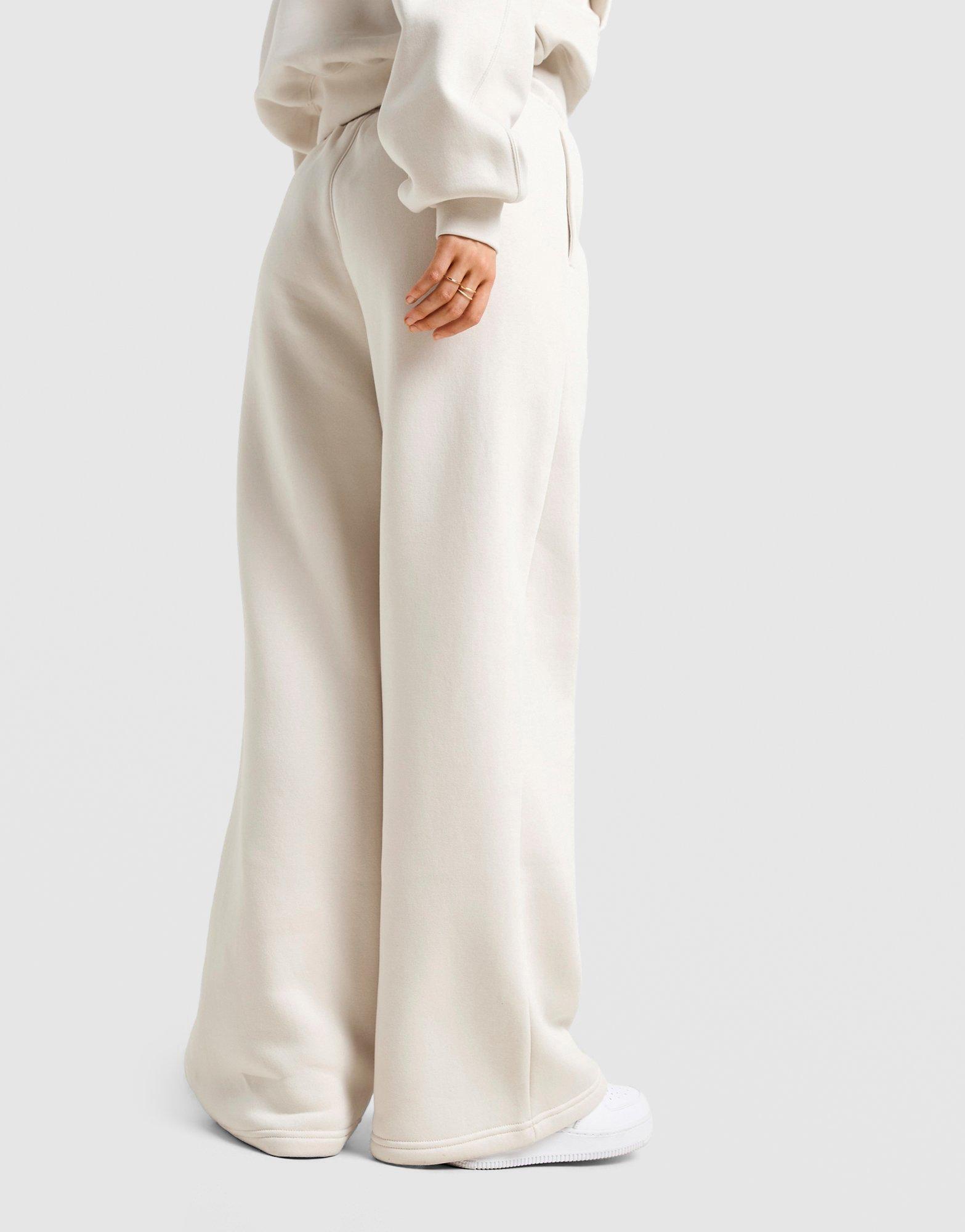 Ženske hlače JORDAN HLAČE W J BRK FLC OH PANT IH2394-104 bež