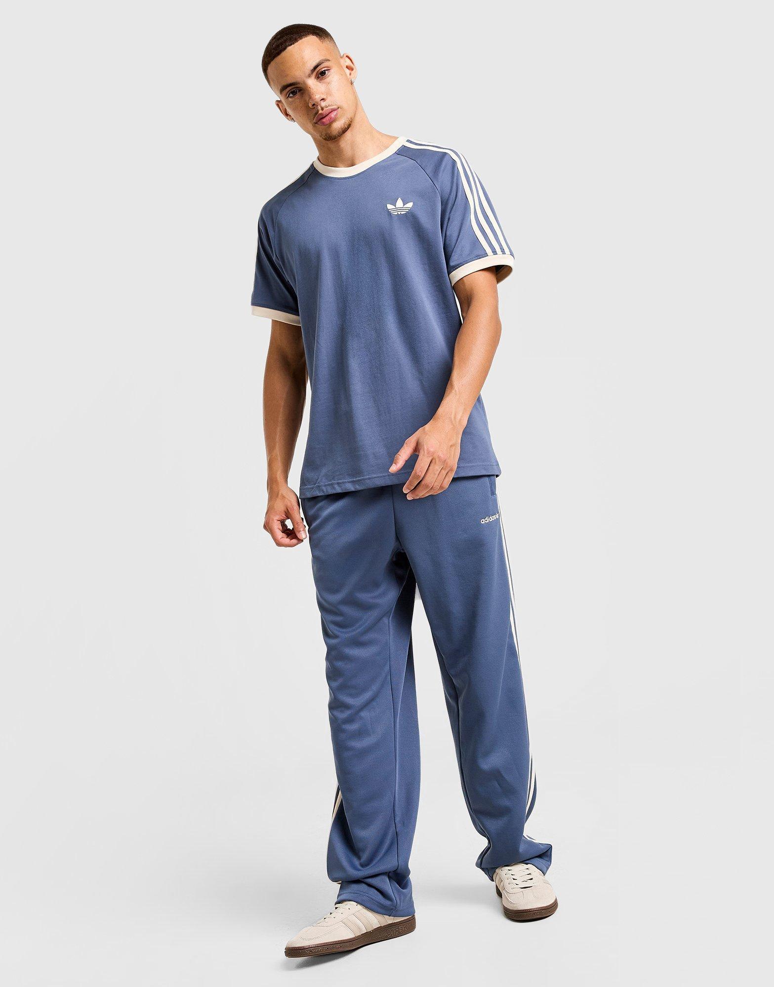 Pánske nohavice ADIDAS NOHAVICE  FIRST PANT KD9115 Modrá