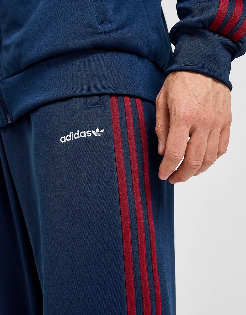 Pantaloni pentru bărbați ADIDAS PANTALONI  FIRST TP KD9117 Bleumarin