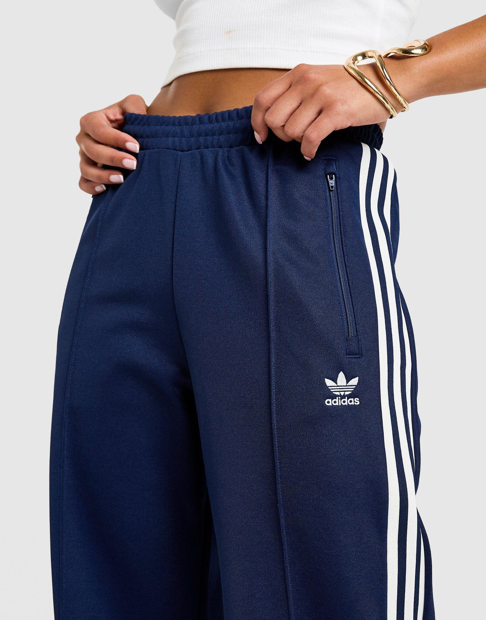 Жіночі штани ADIDAS ШТАНИ ADICOLOR CLASSIC TRACK PANT REGULAR KD4234 Темно-синій
