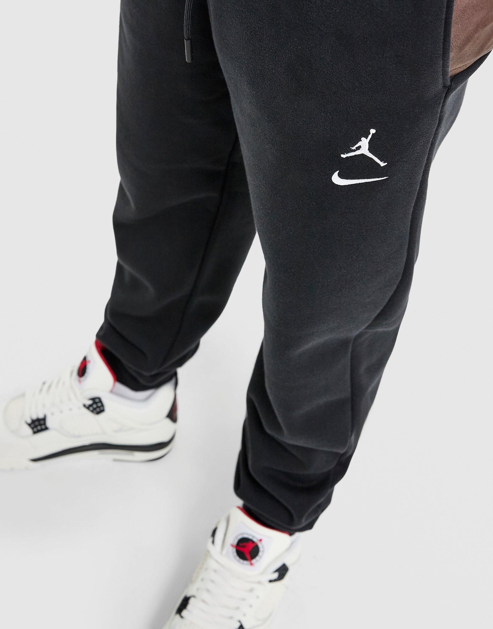 Pantaloni pentru bărbați JORDAN PANTALONI  SWOOSH JDAN PNT BLK IM1361-010 Negru