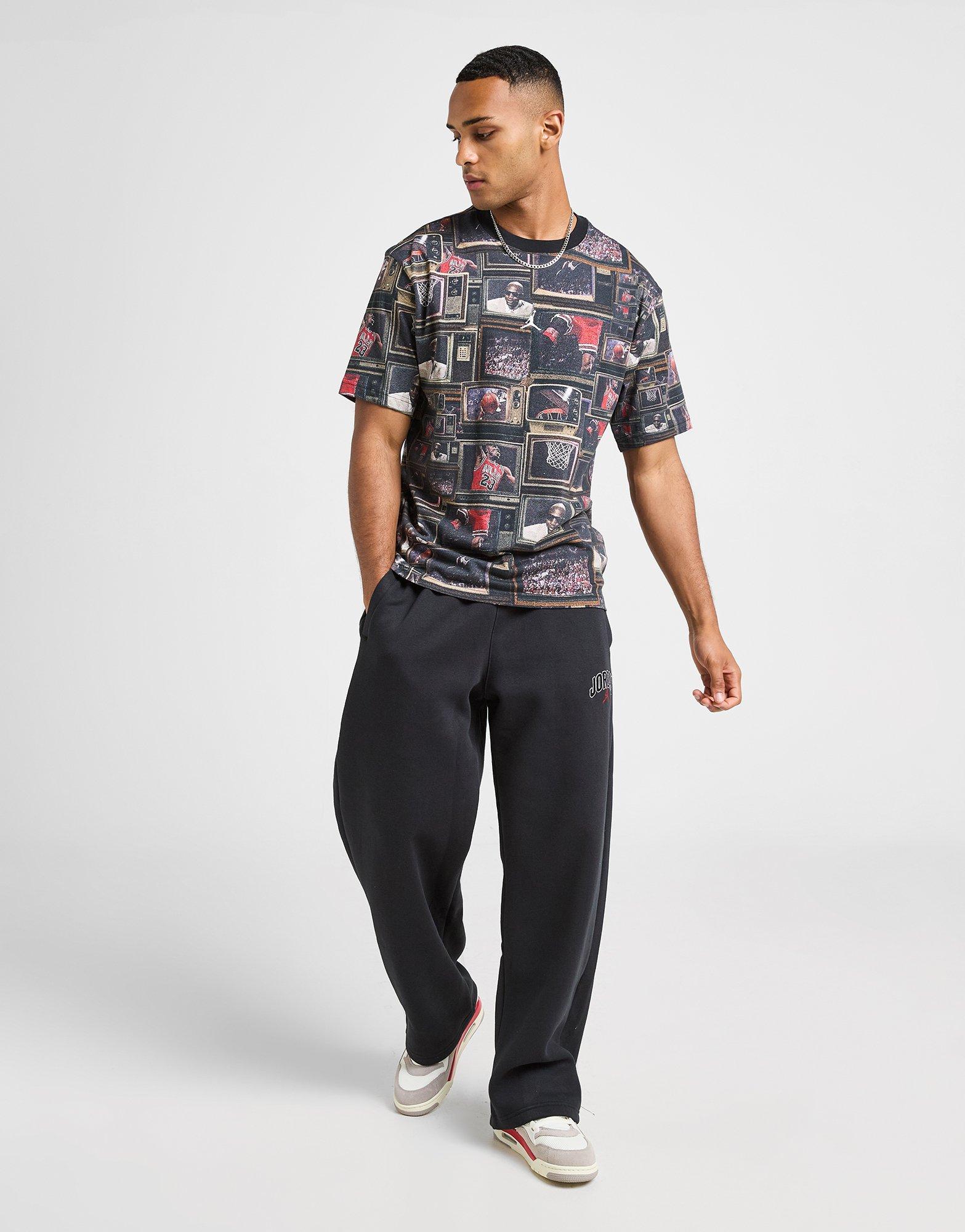 Vyriški marškiniai JORDAN MARŠKINĖLIAI M J BRK TV AOP SS CREW HQ8946-010 Juoda