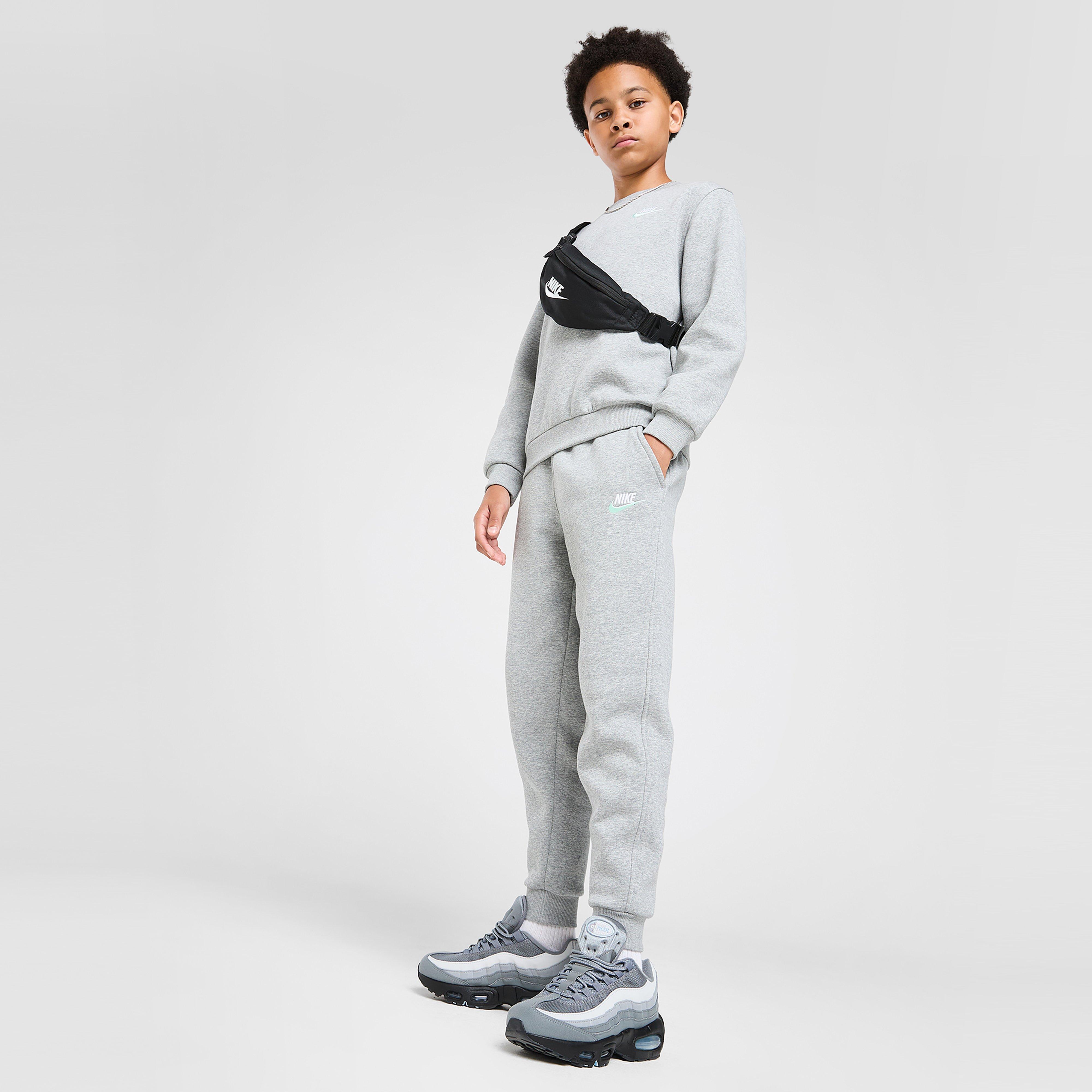 Detské nohavice NIKE NOHAVICE  K NSW CLUB FLC JGGR LBR