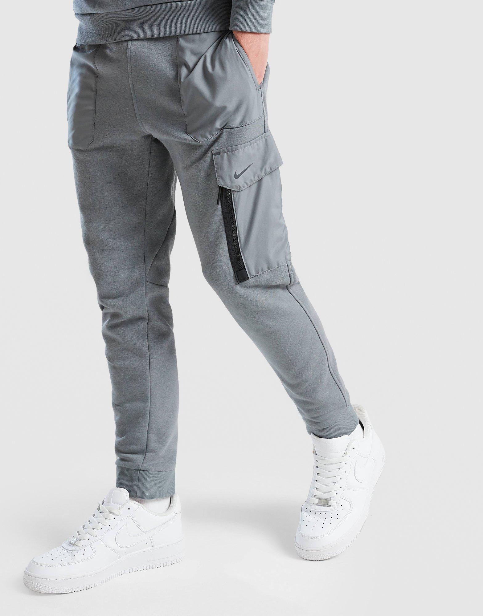 Дитячі штани NIKE ШТАНИ K NSW CITY UTILITY EO FLC PANT FZ5022-084 Сірий