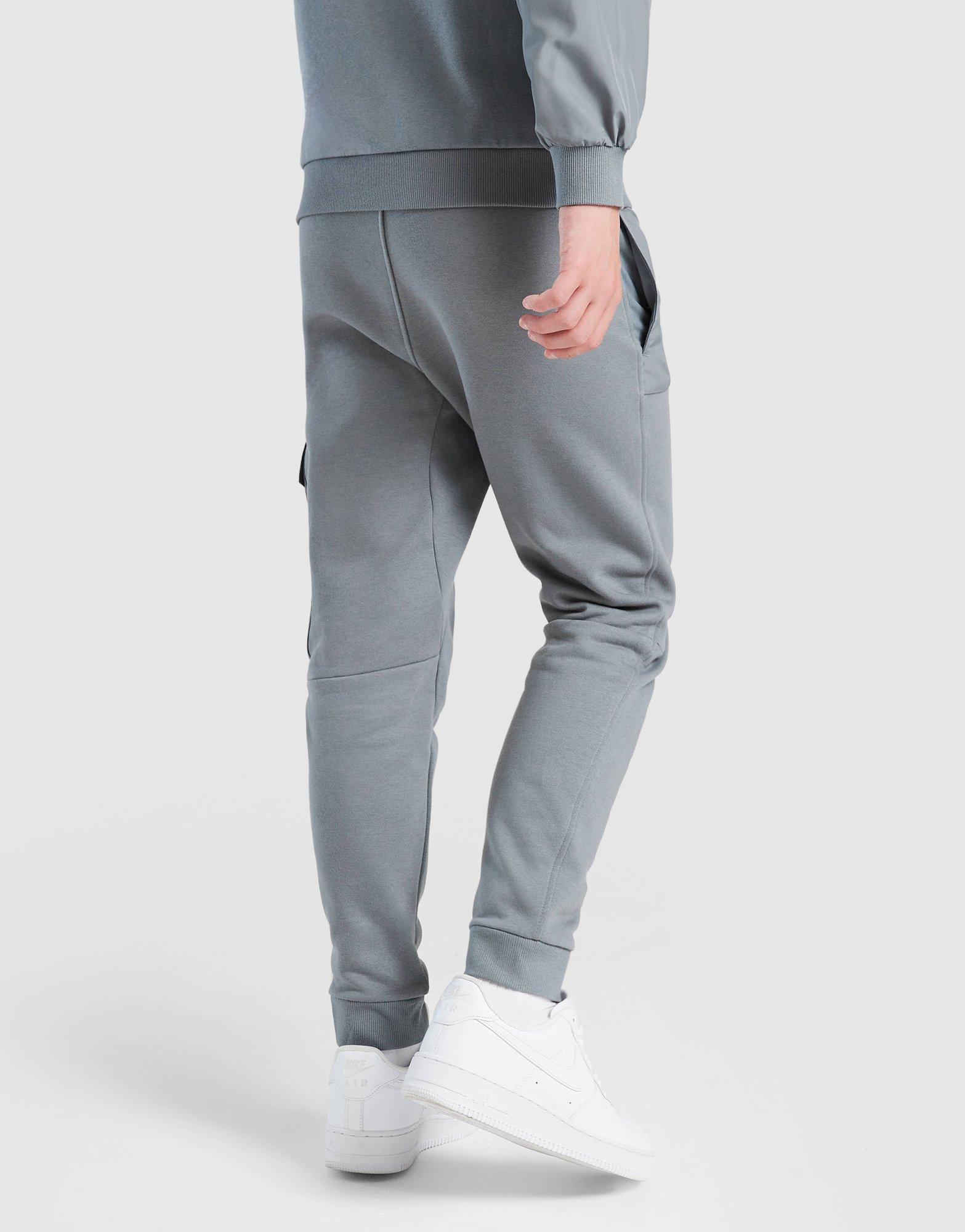 Дитячі штани NIKE ШТАНИ K NSW CITY UTILITY EO FLC PANT FZ5022-084 Сірий