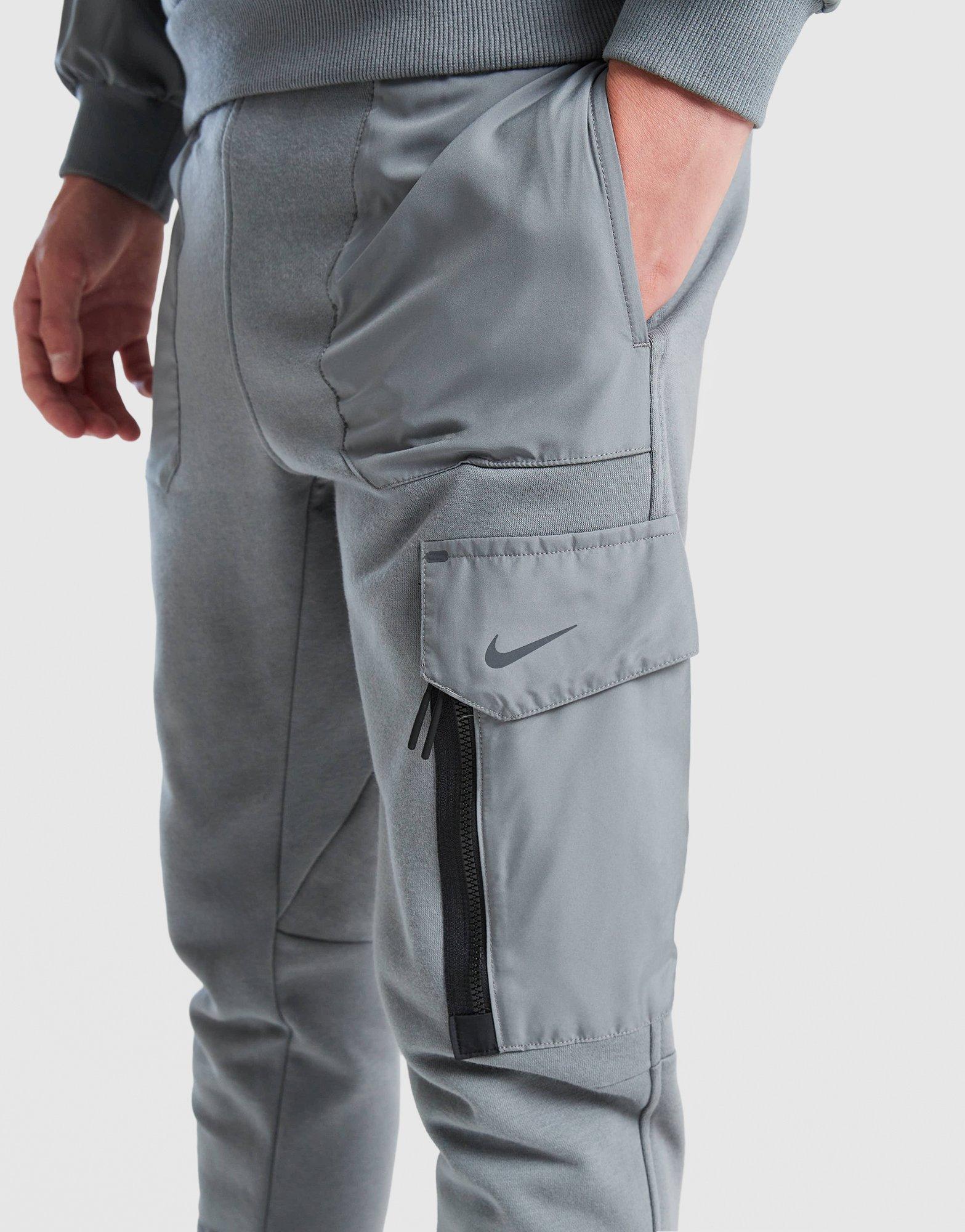 Дитячі штани NIKE ШТАНИ K NSW CITY UTILITY EO FLC PANT FZ5022-084 Сірий
