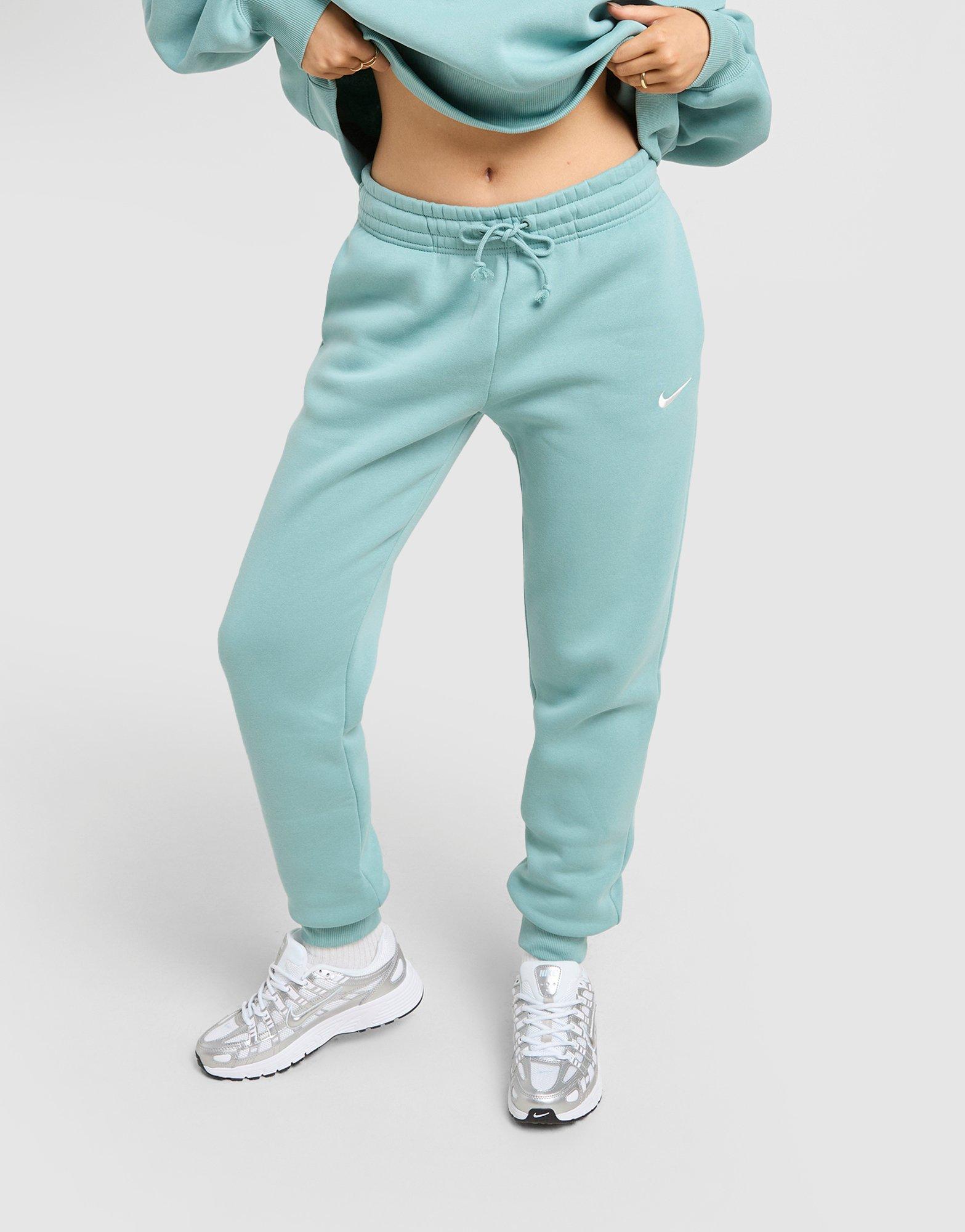 Жіночі штани NIKE ШТАНИ W NSW PHNX FLC MR PANT STD FZ7626-017 М'ятний