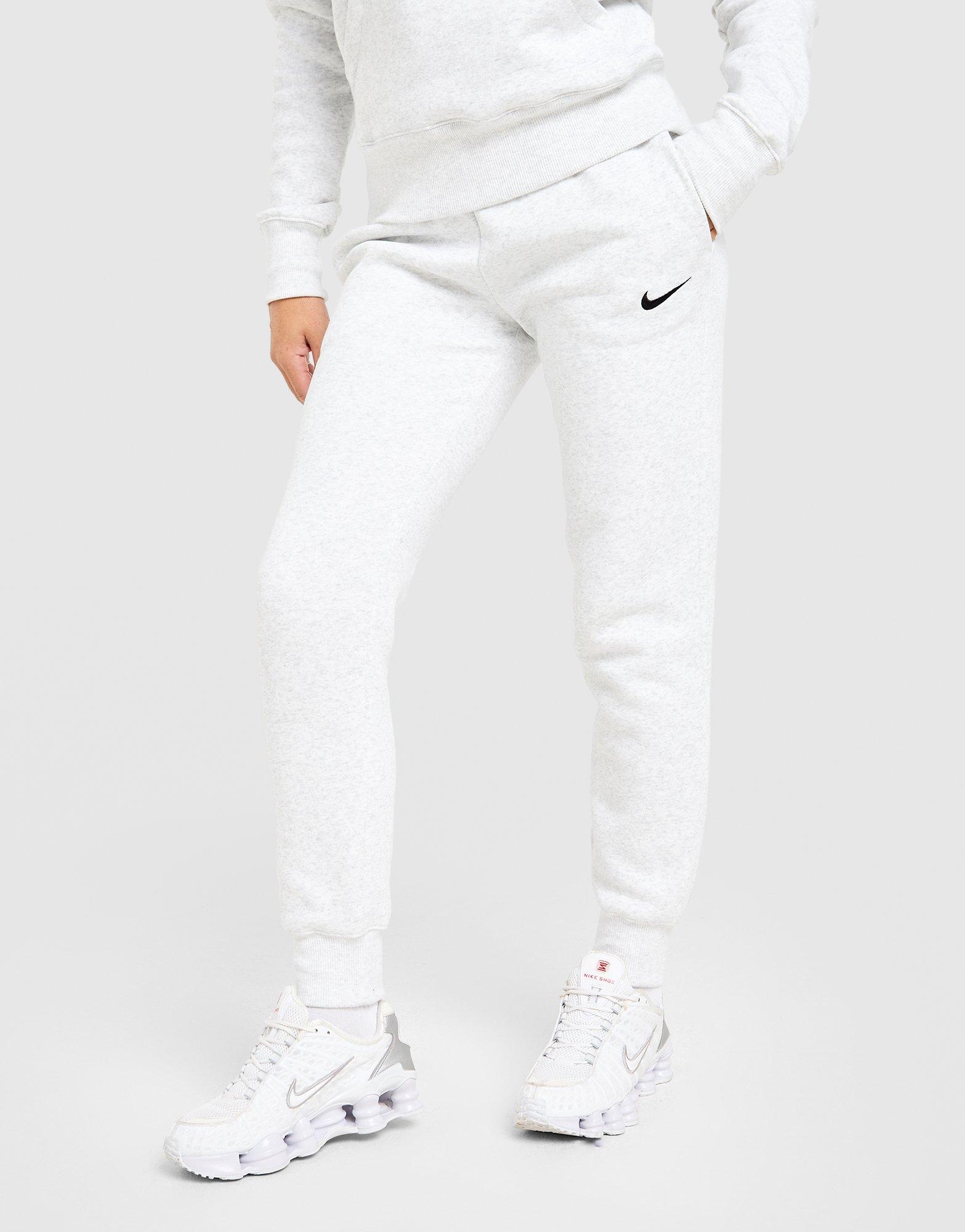 Moteriškos kelnės NIKE KELNĖS W NSW PHNX FLC MR PANT STD FZ7626-051 Pilka