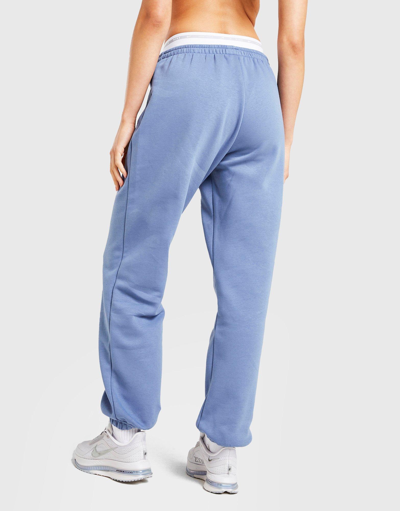 Moteriškos kelnės NIKE KELNĖS W NSW PHNX FLC HR PANT GLS IH4055-433 Mėlyna