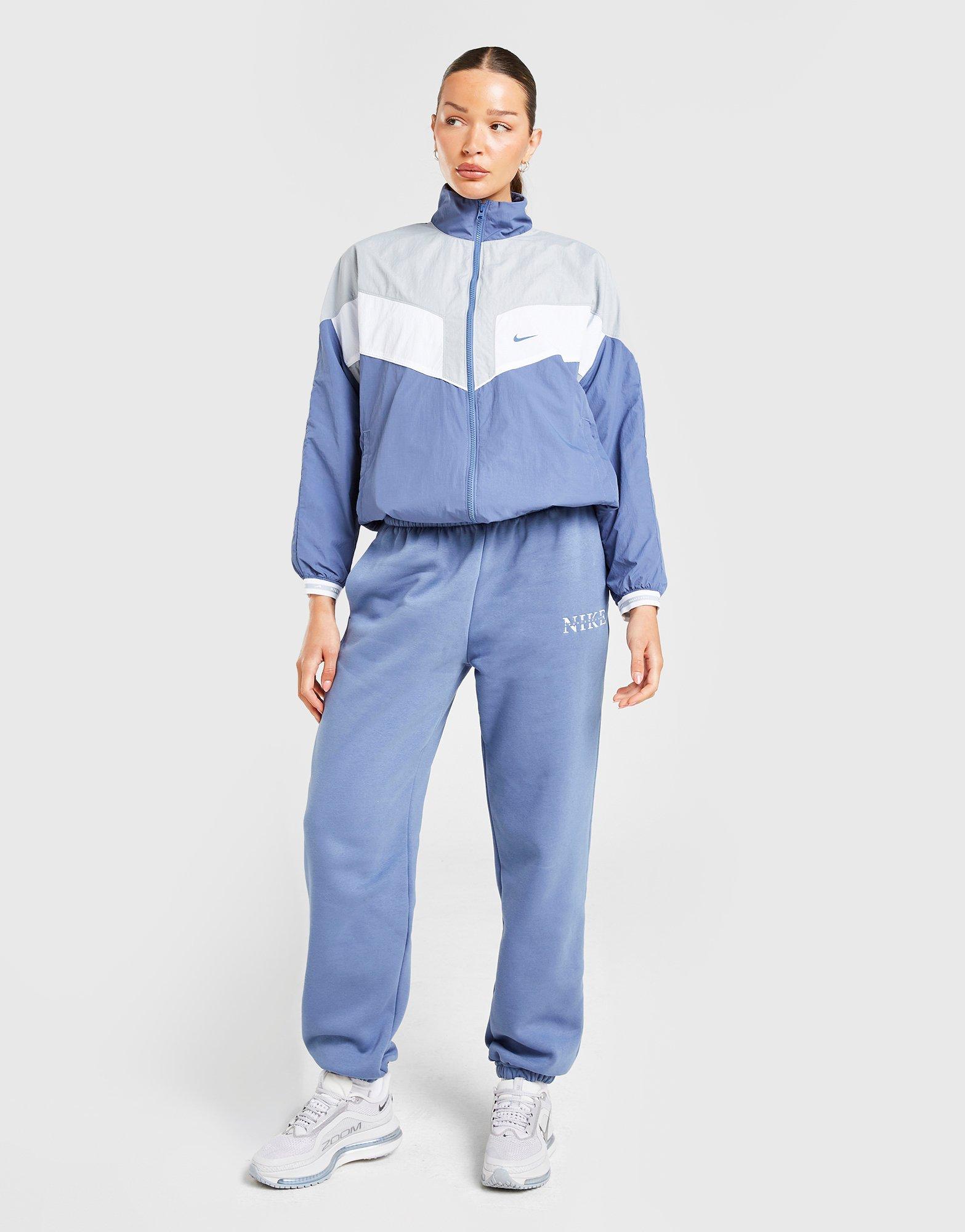 Moteriškos kelnės NIKE KELNĖS W NSW PHNX FLC HR PANT GLS IH4055-433 Mėlyna