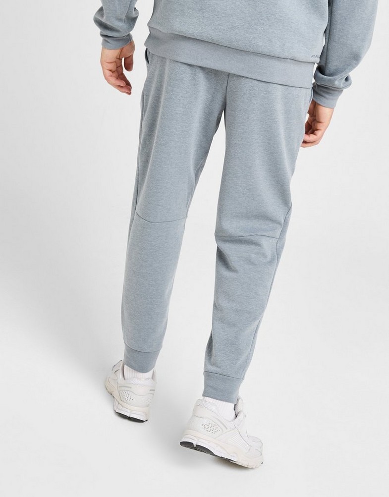 Pánske nohavice NIKE NOHAVICE  M NK DF UV PRIMARY JOGGER PANT FZ0975-065 Sivá