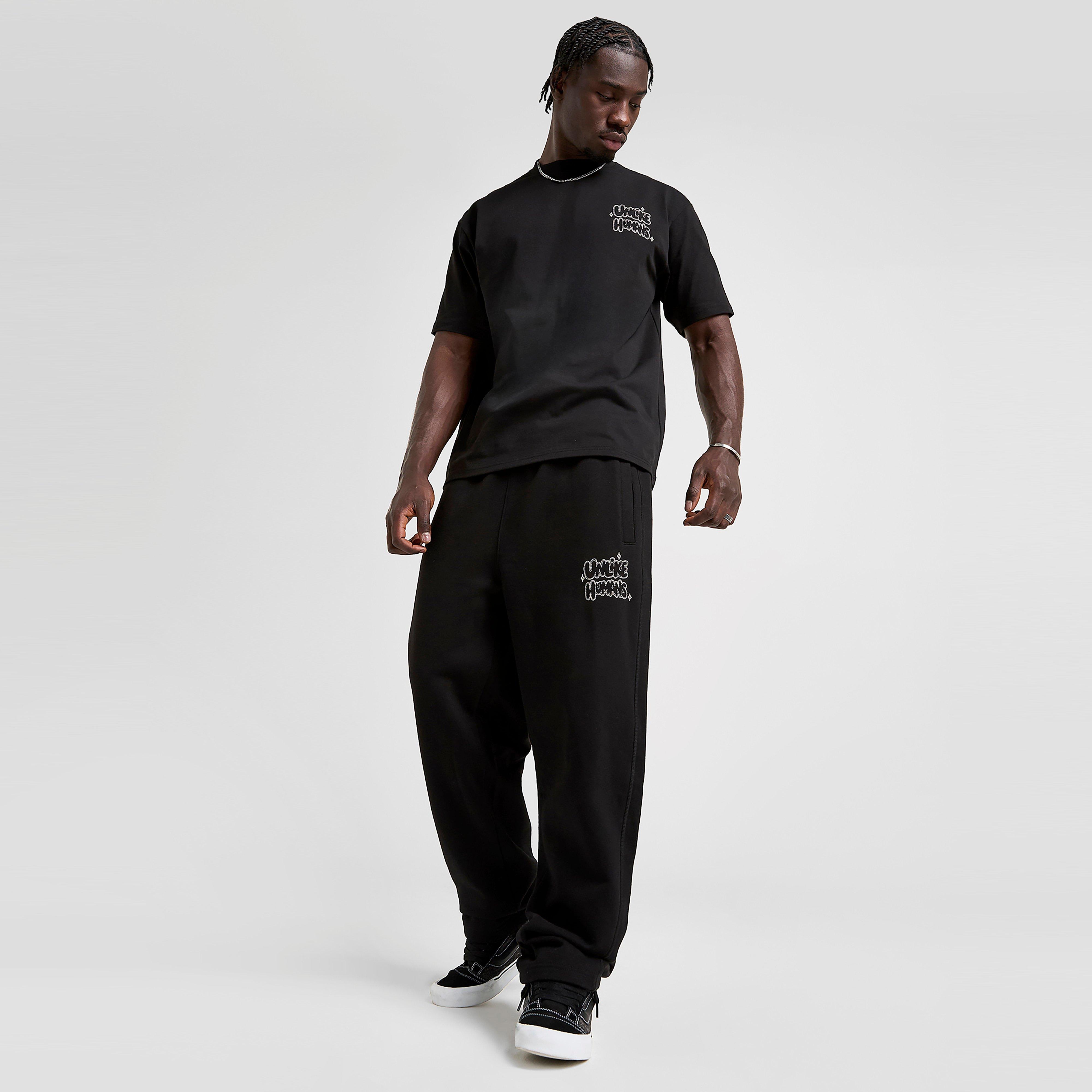 Férfi melegítőnadrág és jogger UNLIKE HUMANS NADRÁG REGENT PNT BLK-BLK