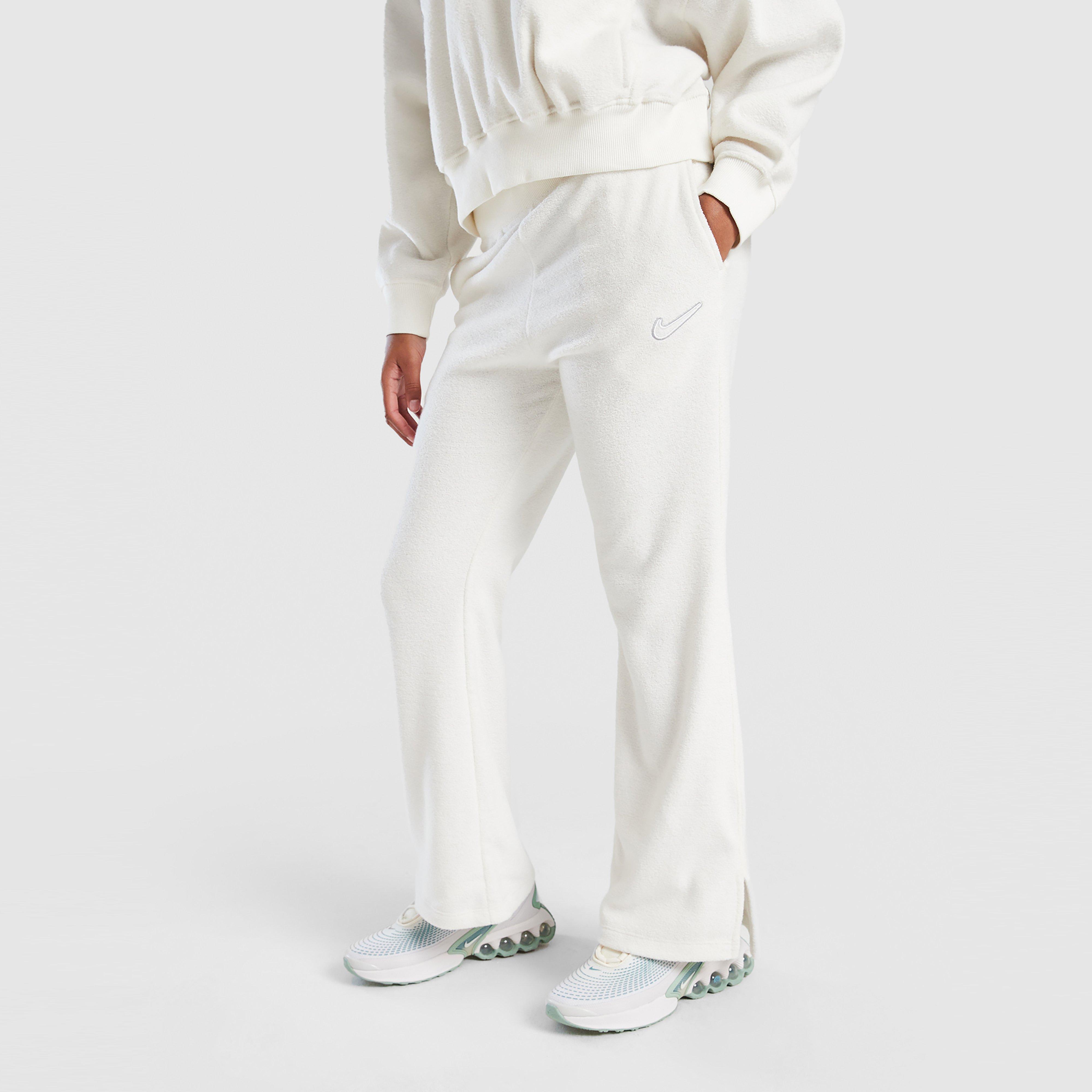 Detské nohavice NIKE NOHAVICE  G NSW FLC PNT COZY