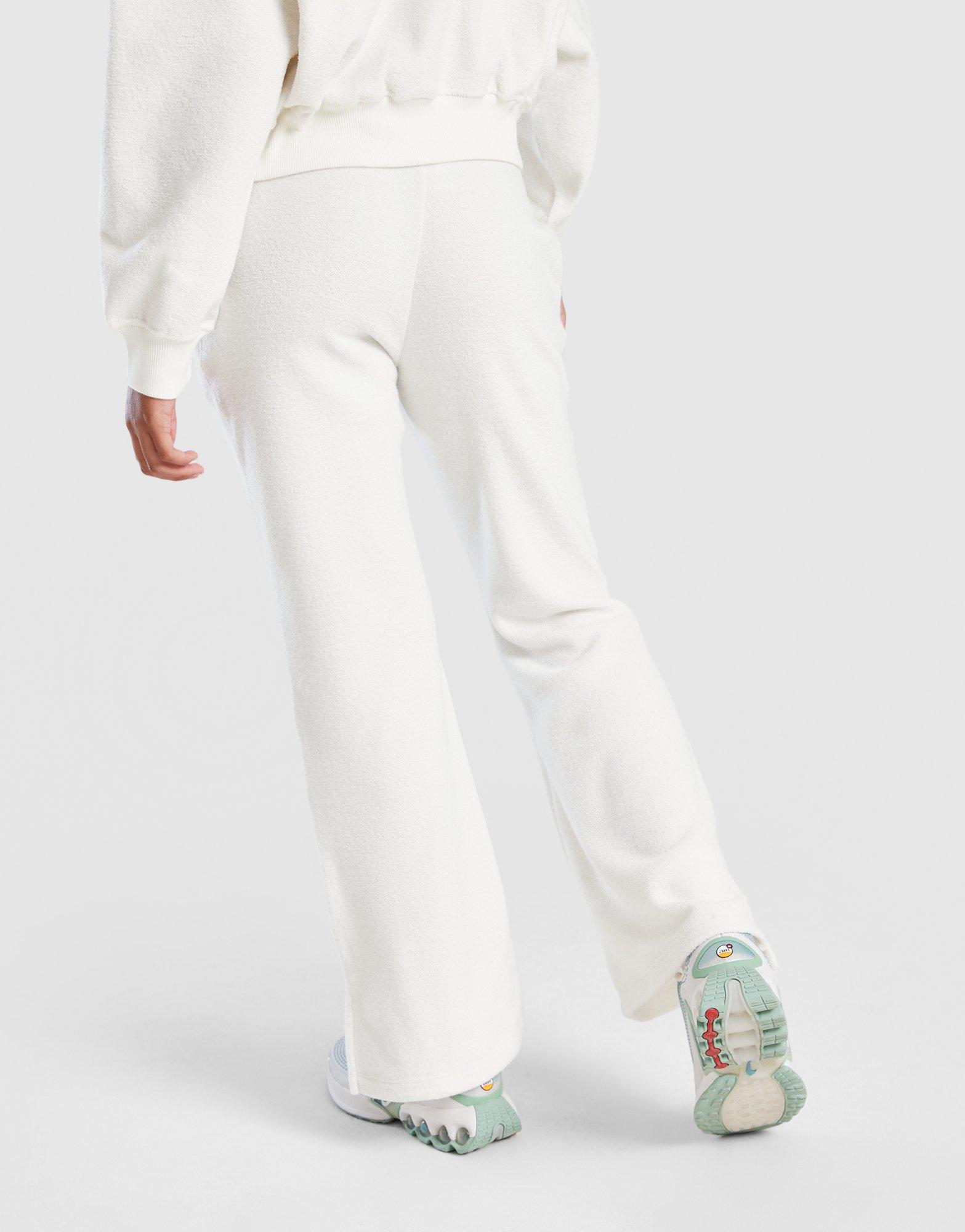 NIKE SPODNIE G NSW FLC PNT COZY HV0407-047 Beżowy